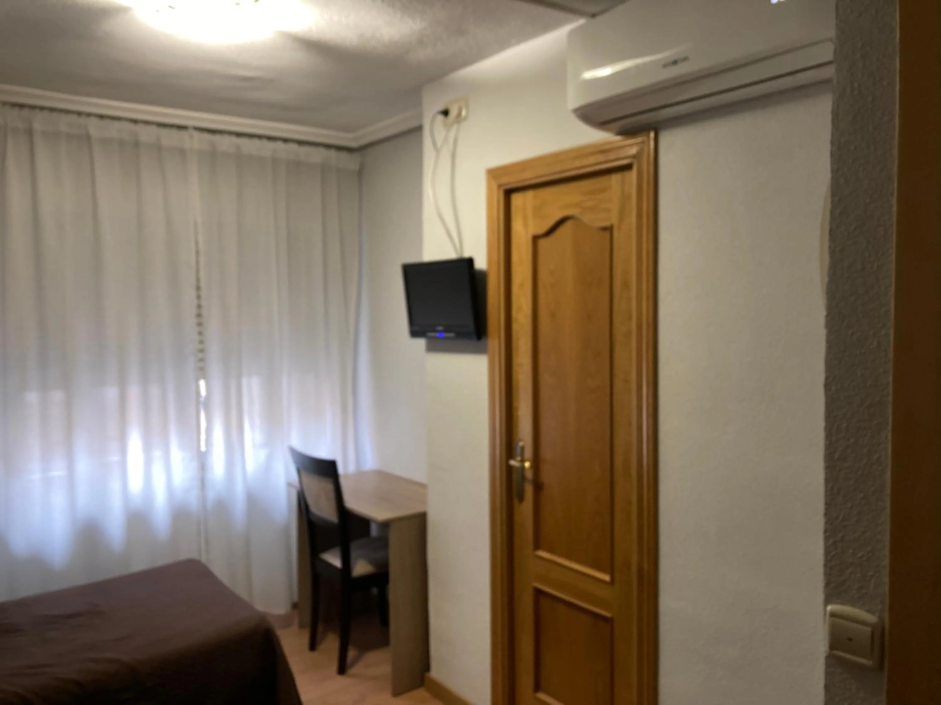 Bed in Hostal Conde David