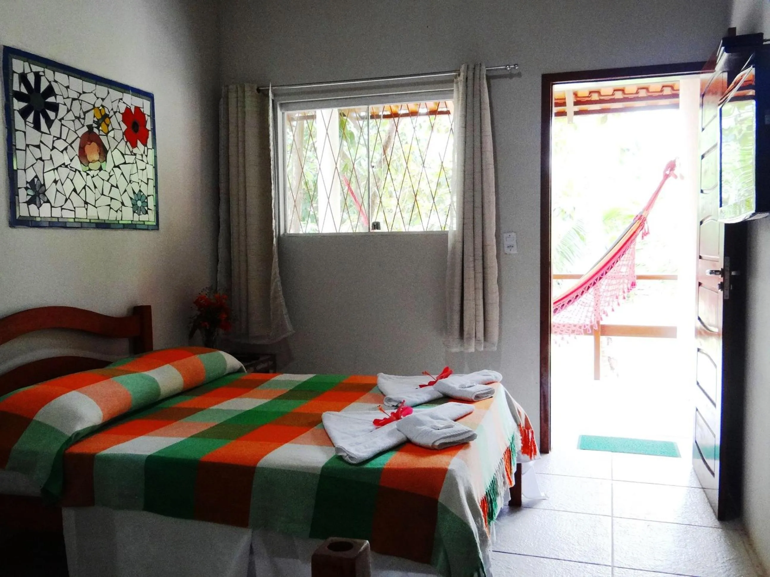 Bed in Pousada Cavalo Marinho