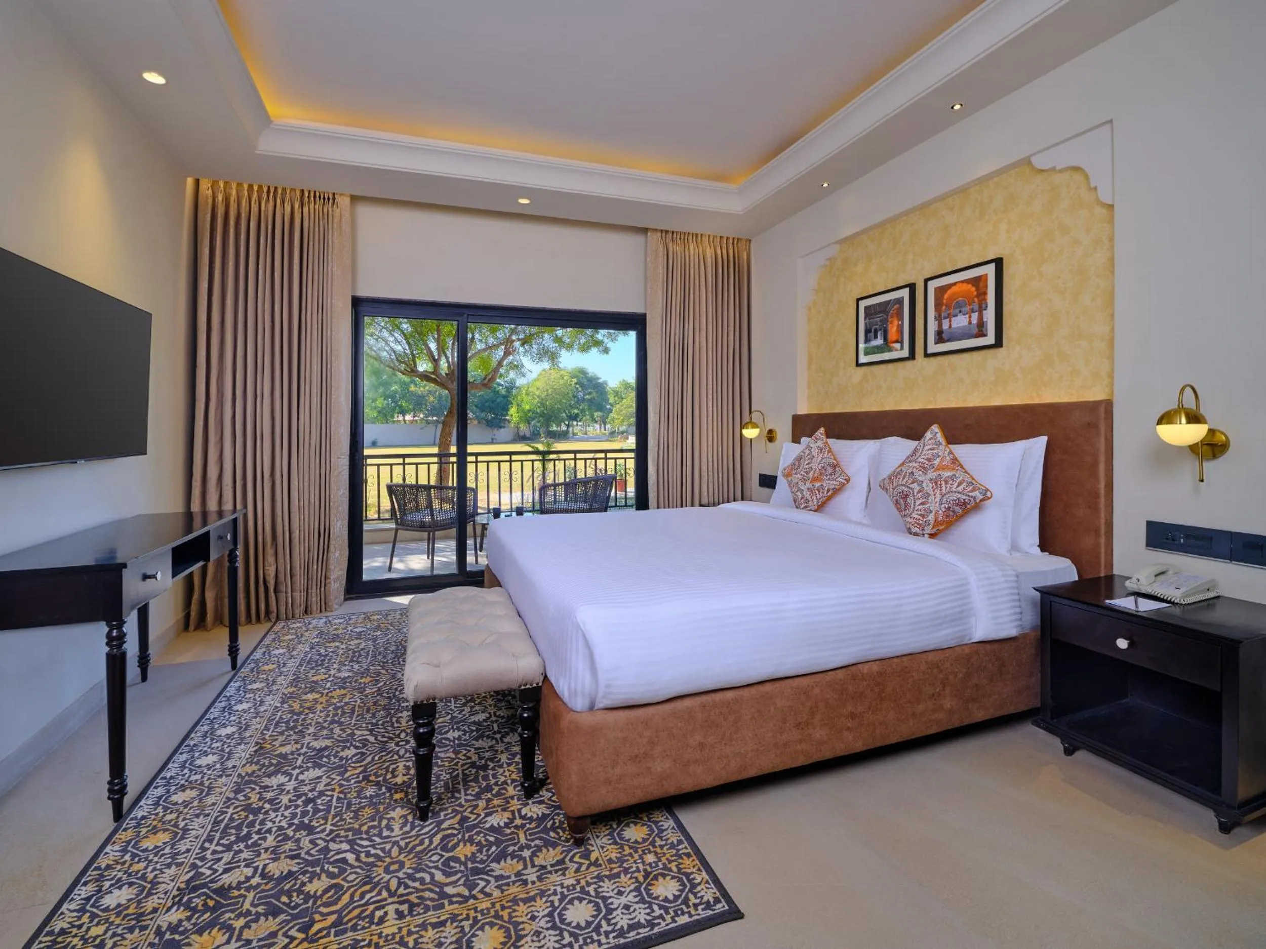 Bed in Pride Amber Vilas Resort & Convention Centre