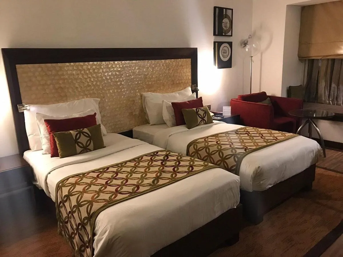 Bedroom, Bed in Pride Premier Bengaluru