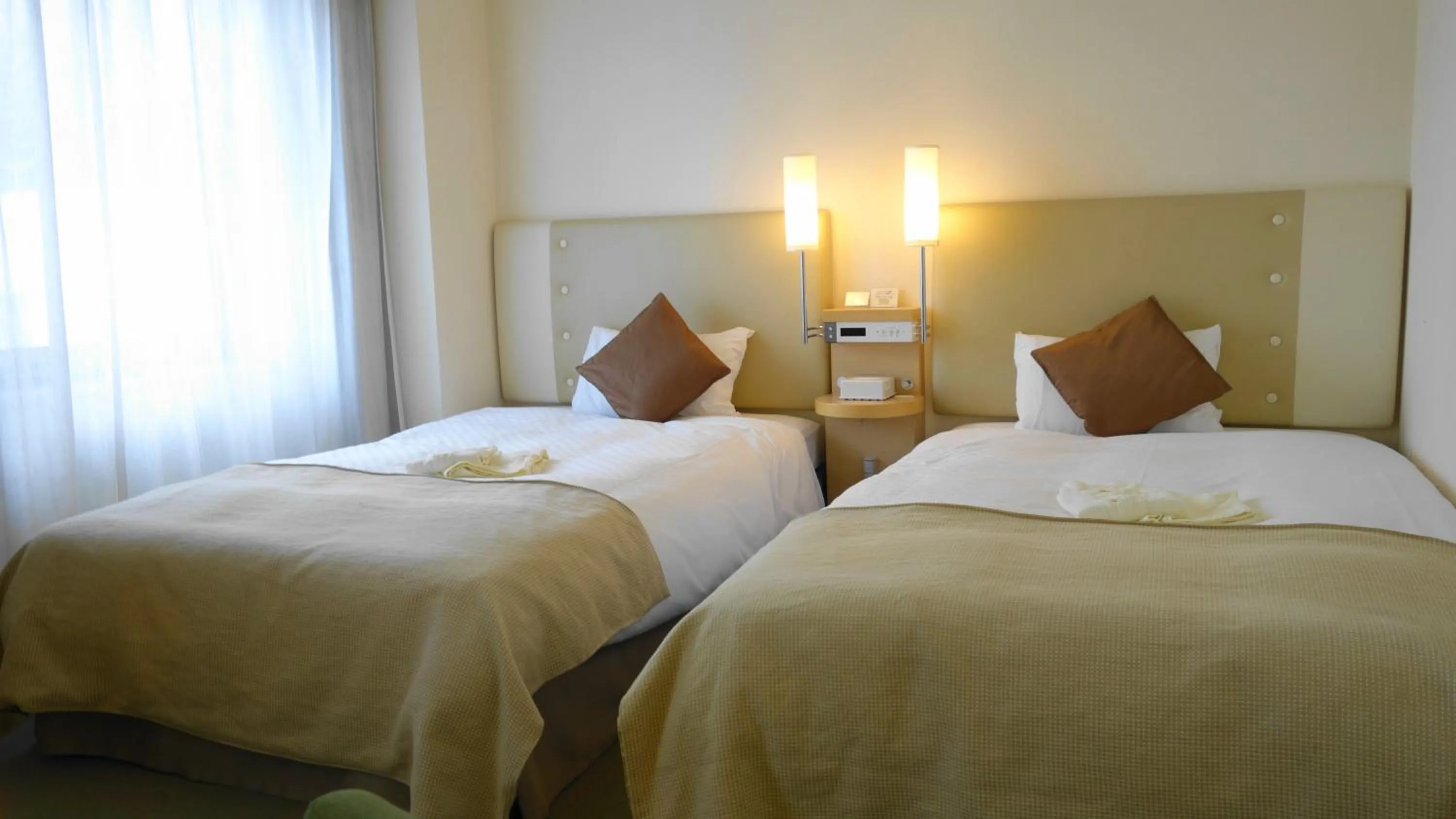 Bed in City Plaza Osaka