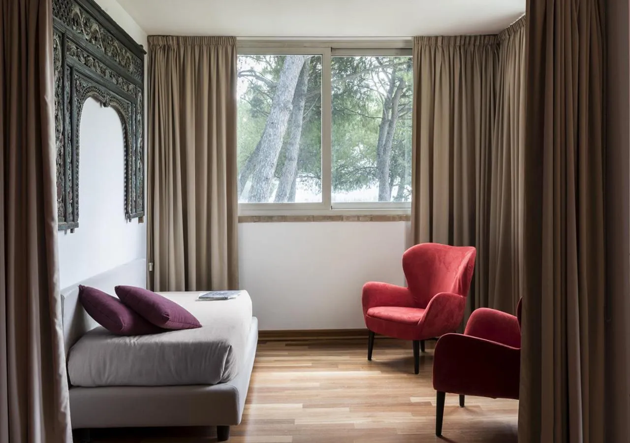 Bed in Finis Africae Hotel