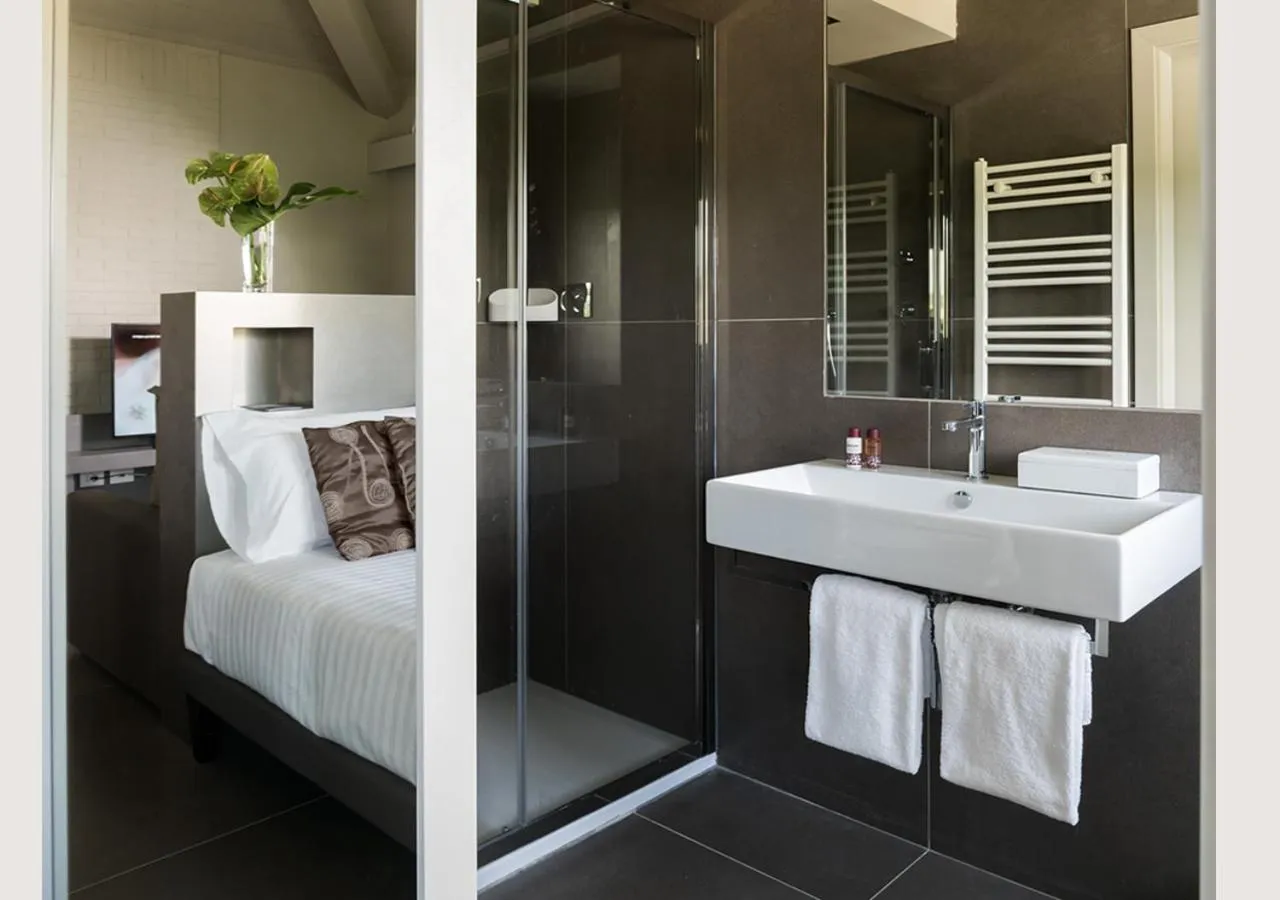 Photo of the whole room, Bed in Finis Africae Hotel