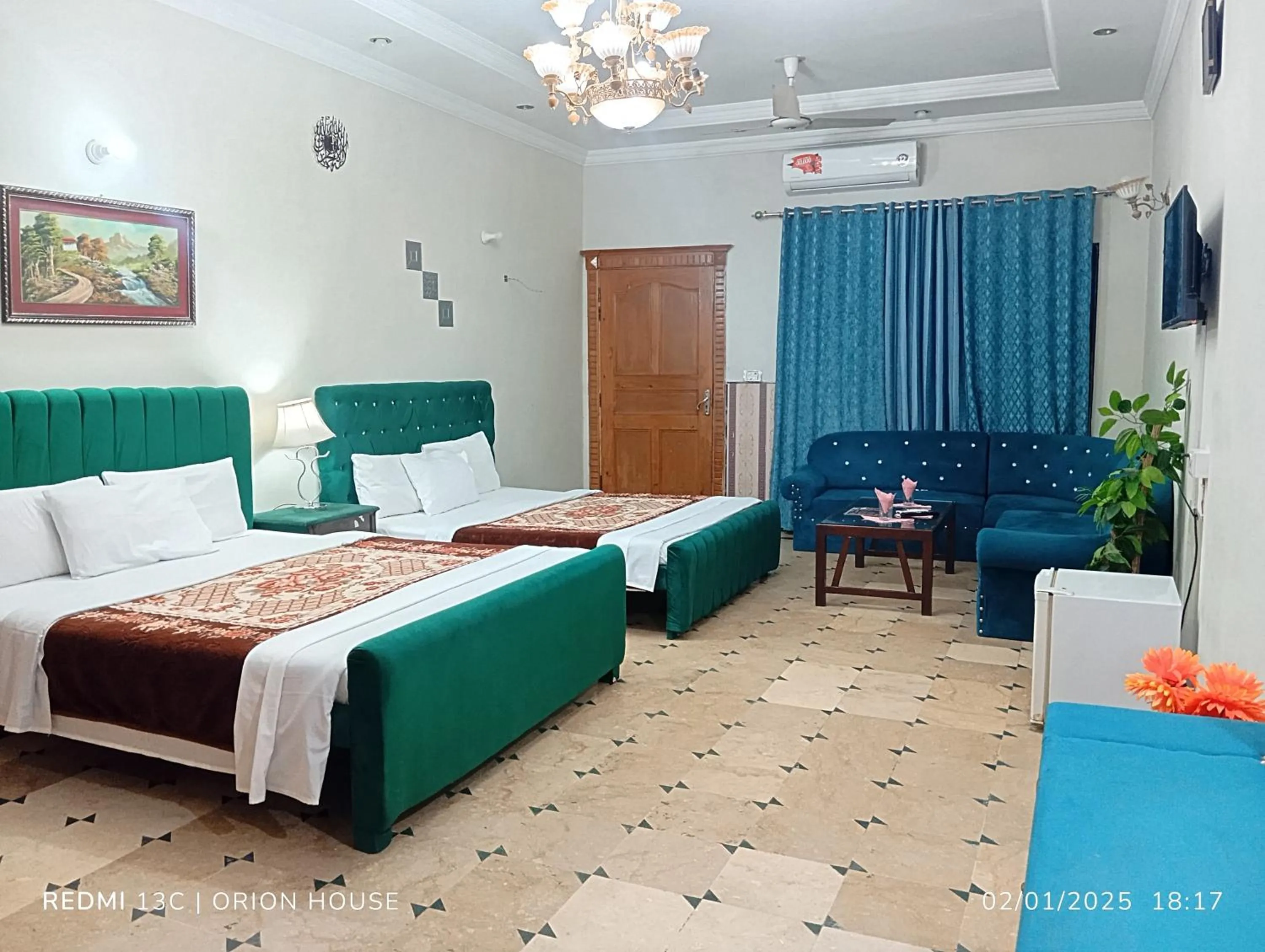Bed in Orion International Guest House