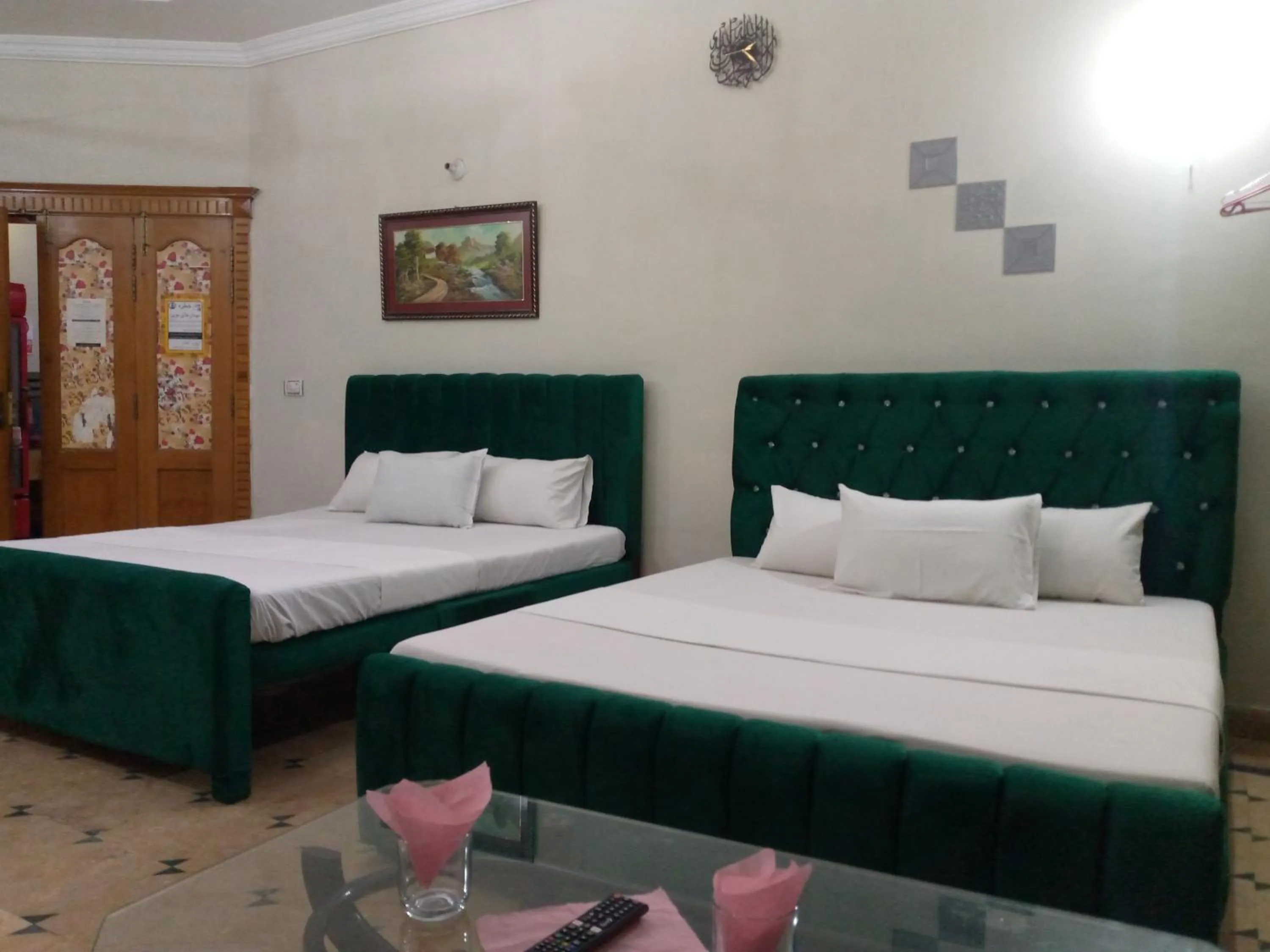 Living room, Bed in Orion International Guest House