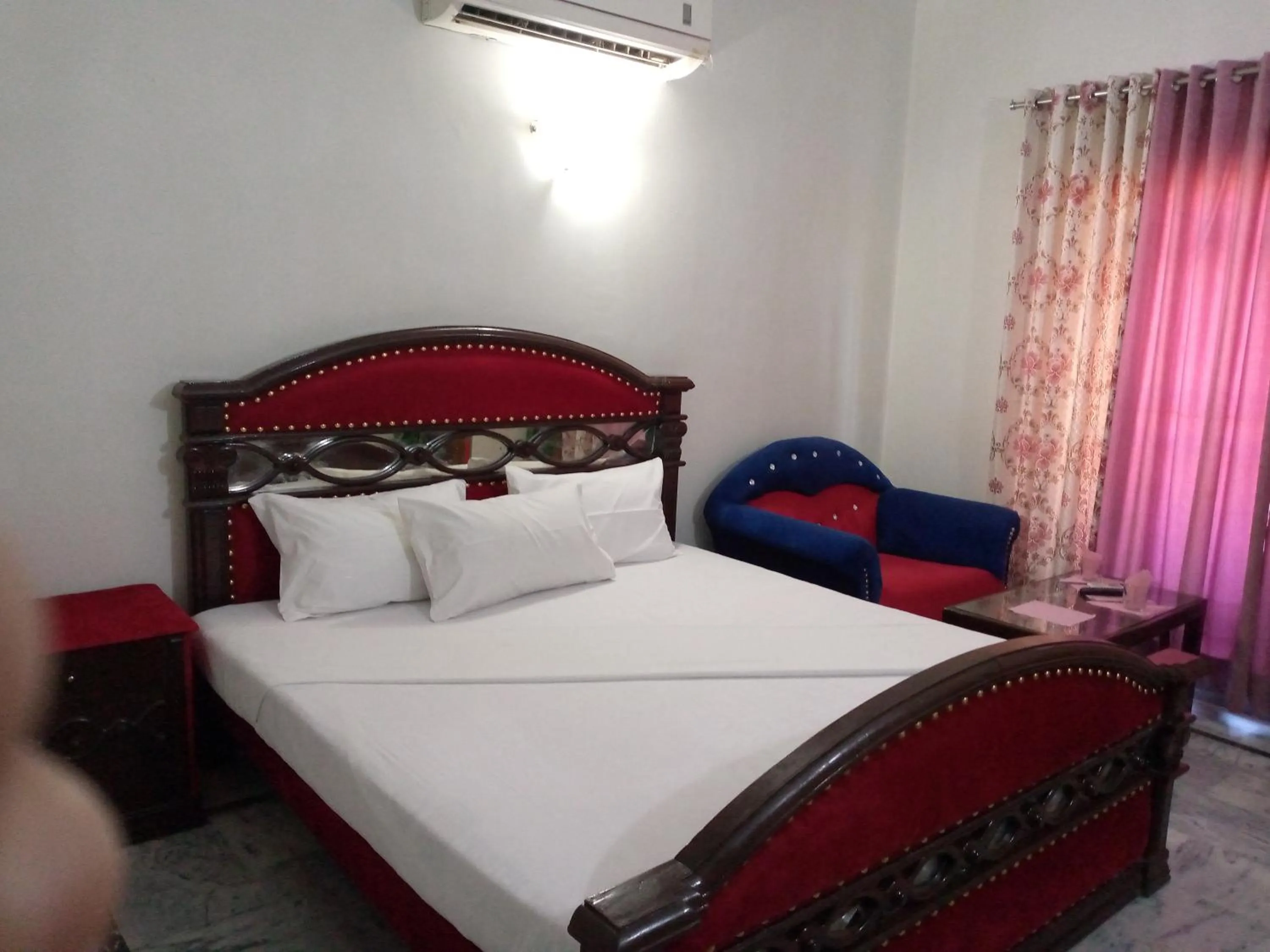 Bed in Orion International Guest House