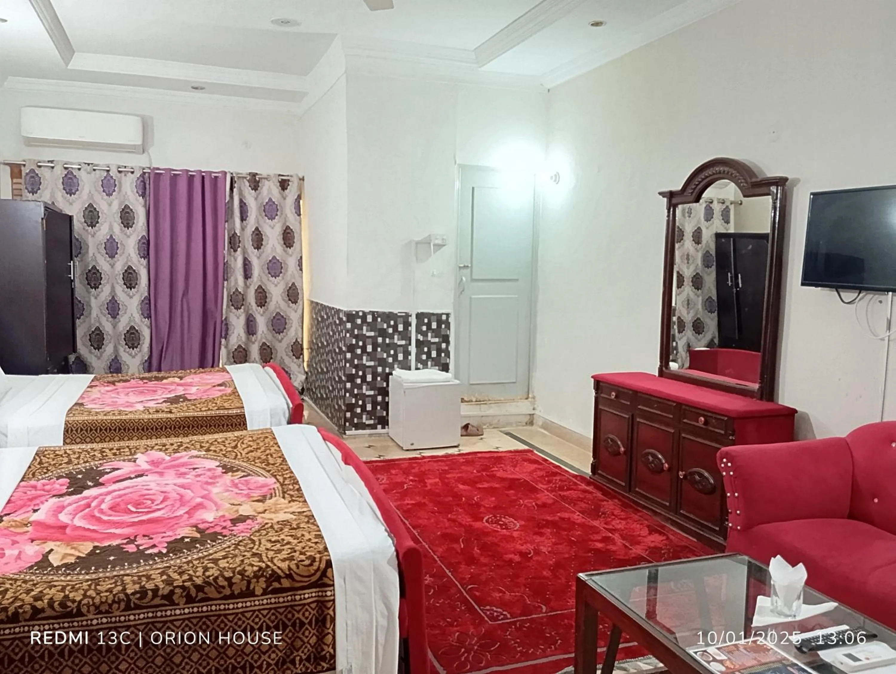 TV and multimedia, Bed in Orion International Guest House