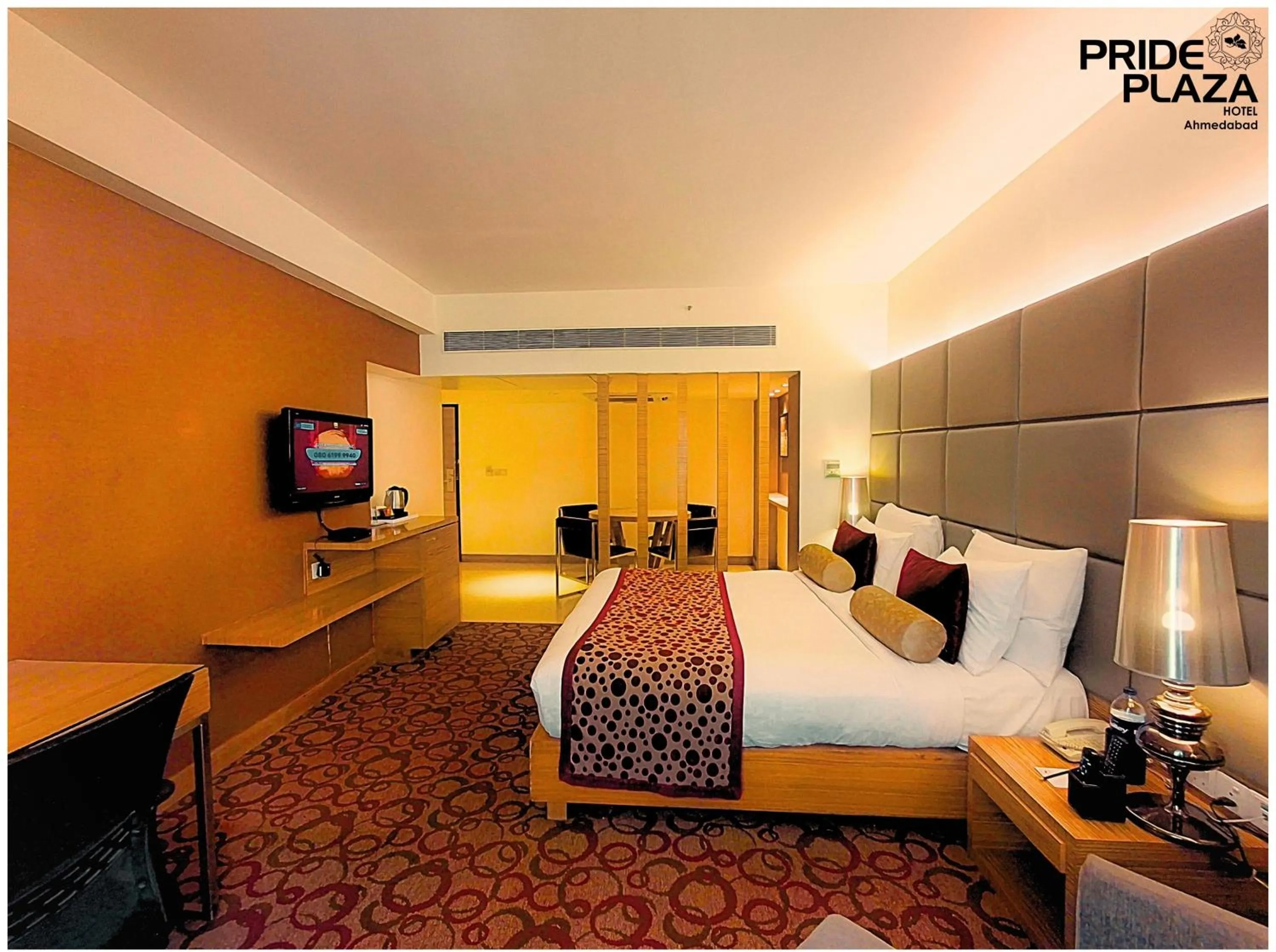 Bed in Pride Plaza Hotel, Ahmedabad