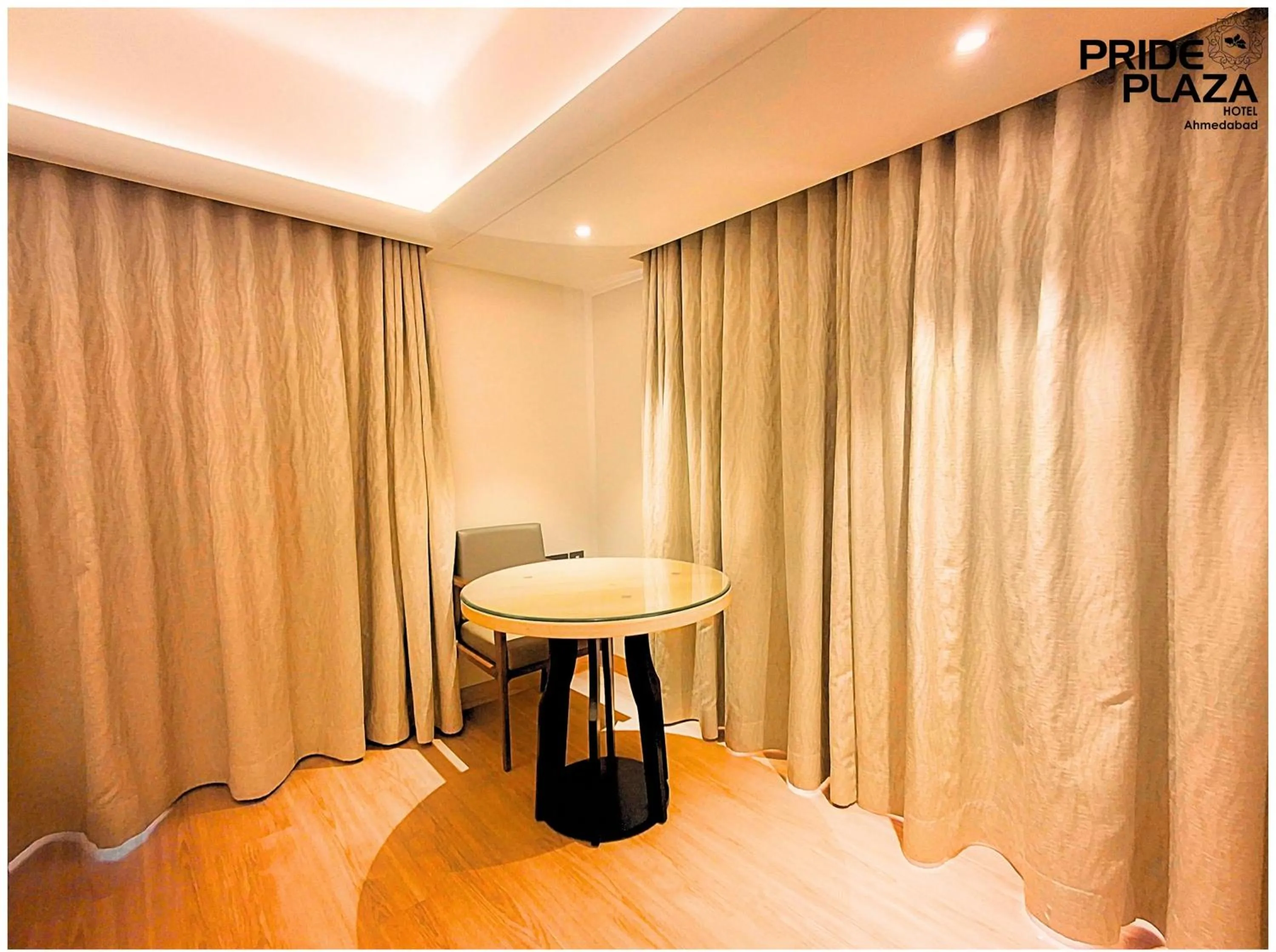 Dining area in Pride Plaza Hotel, Ahmedabad