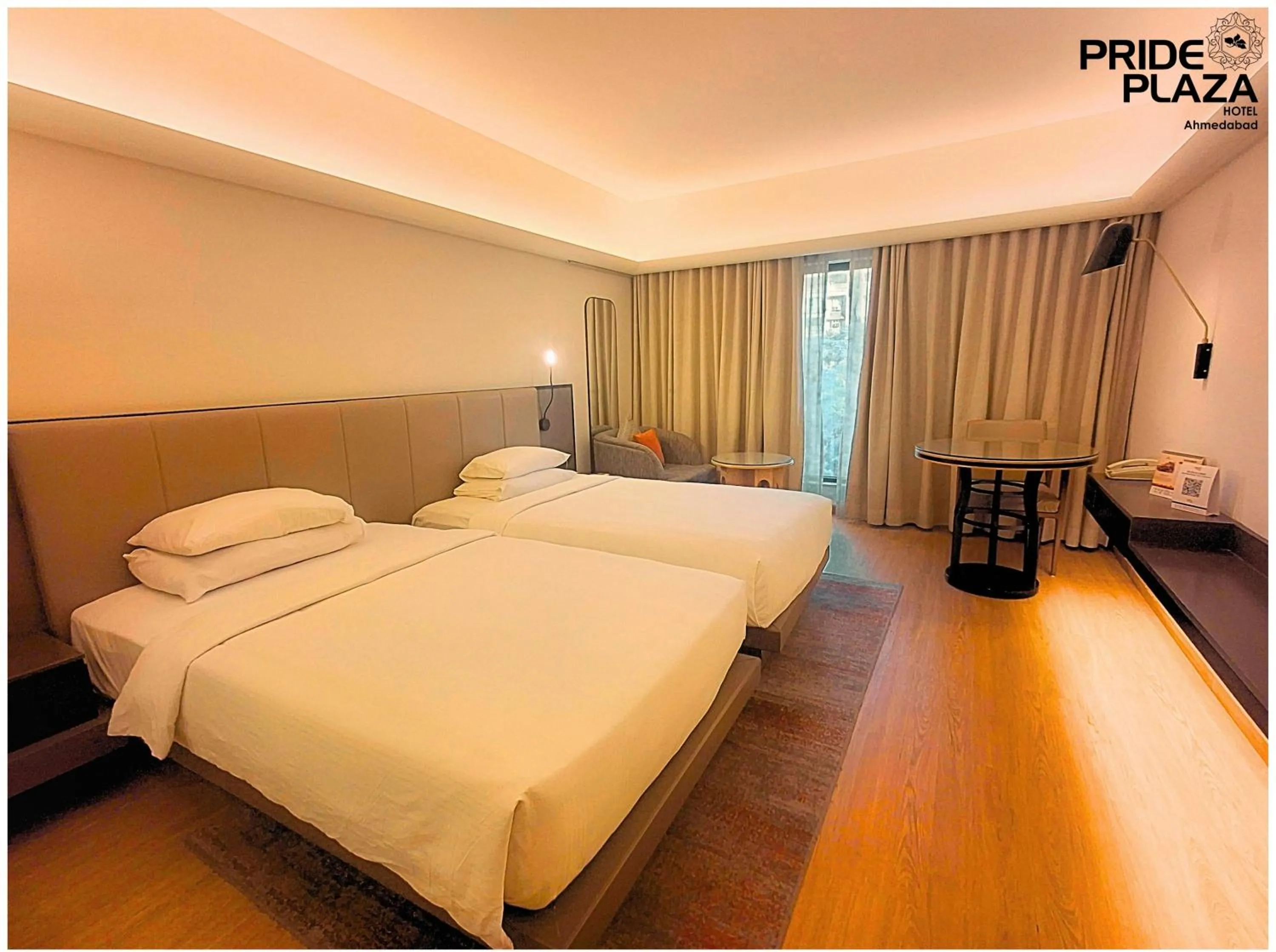 Bed in Pride Plaza Hotel, Ahmedabad