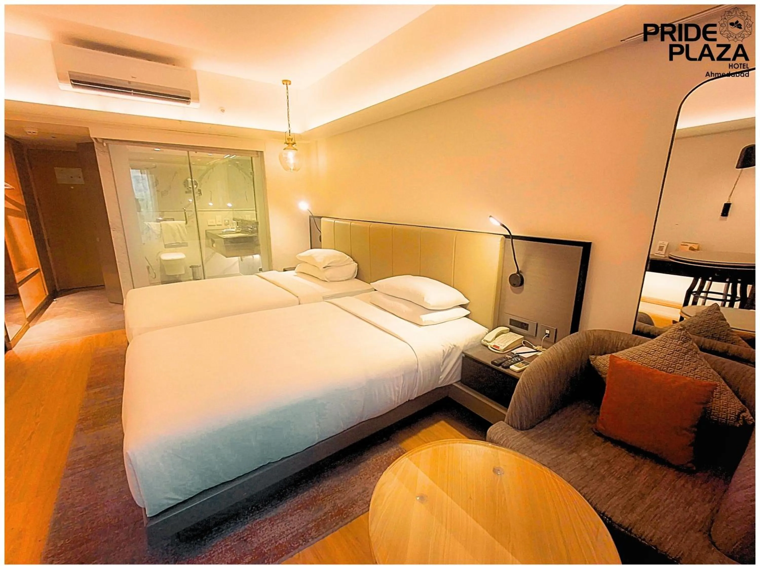 Bed in Pride Plaza Hotel, Ahmedabad
