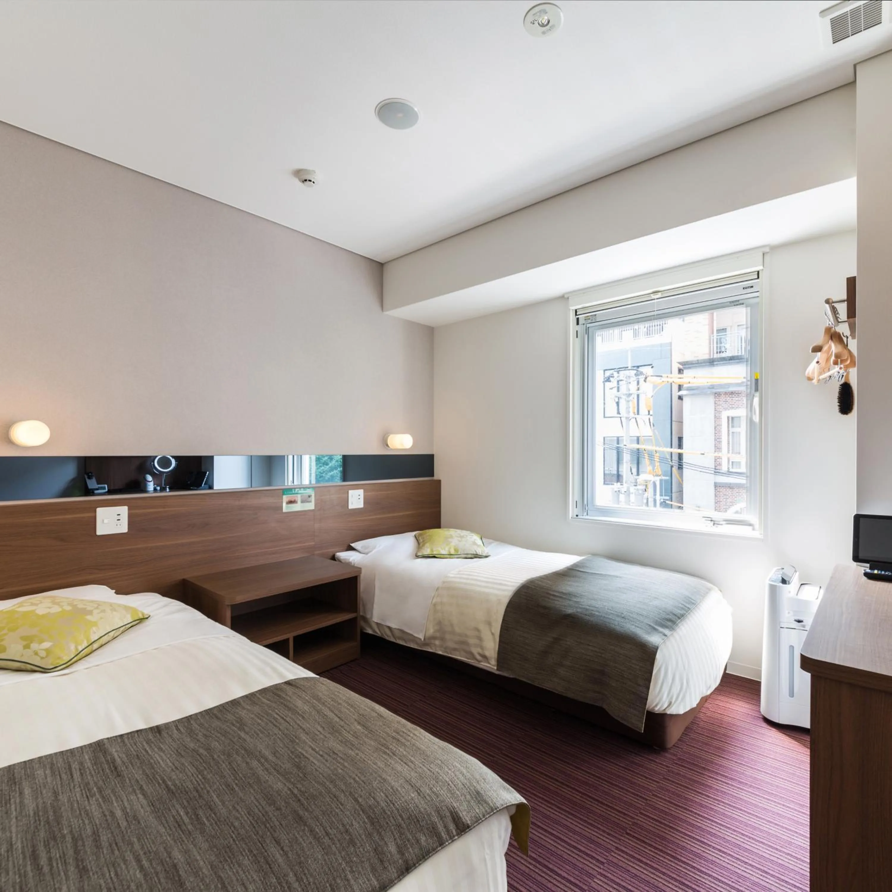 Bed in Super Hotel Premier Hakataeki