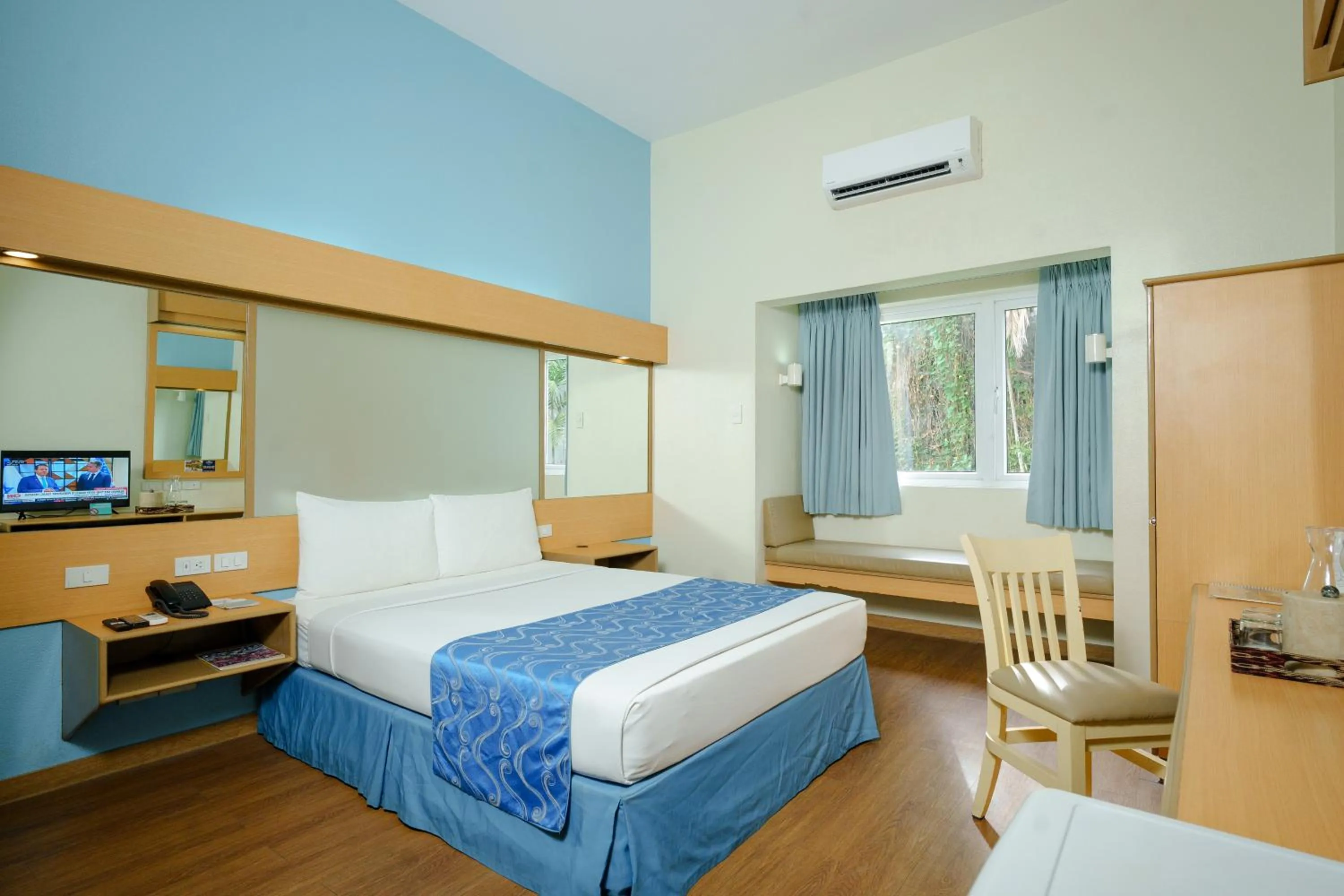 Bed in Microtel by Wyndham Davao