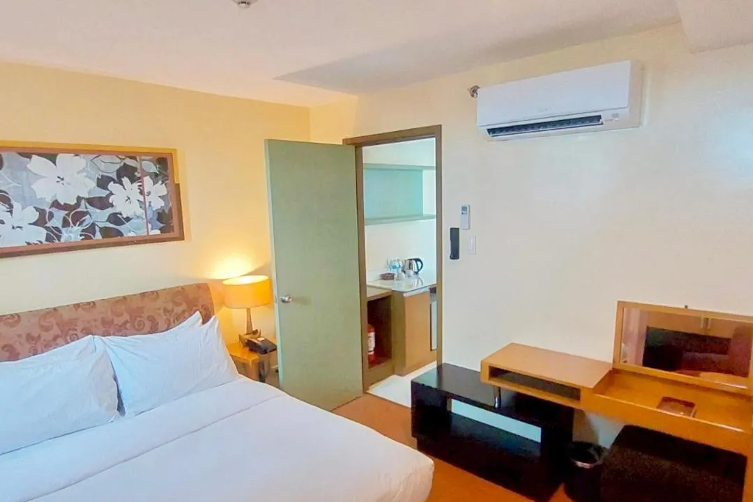 Bed in One Tagaytay Place Hotel Suites OFFICIAL ACCOUNT