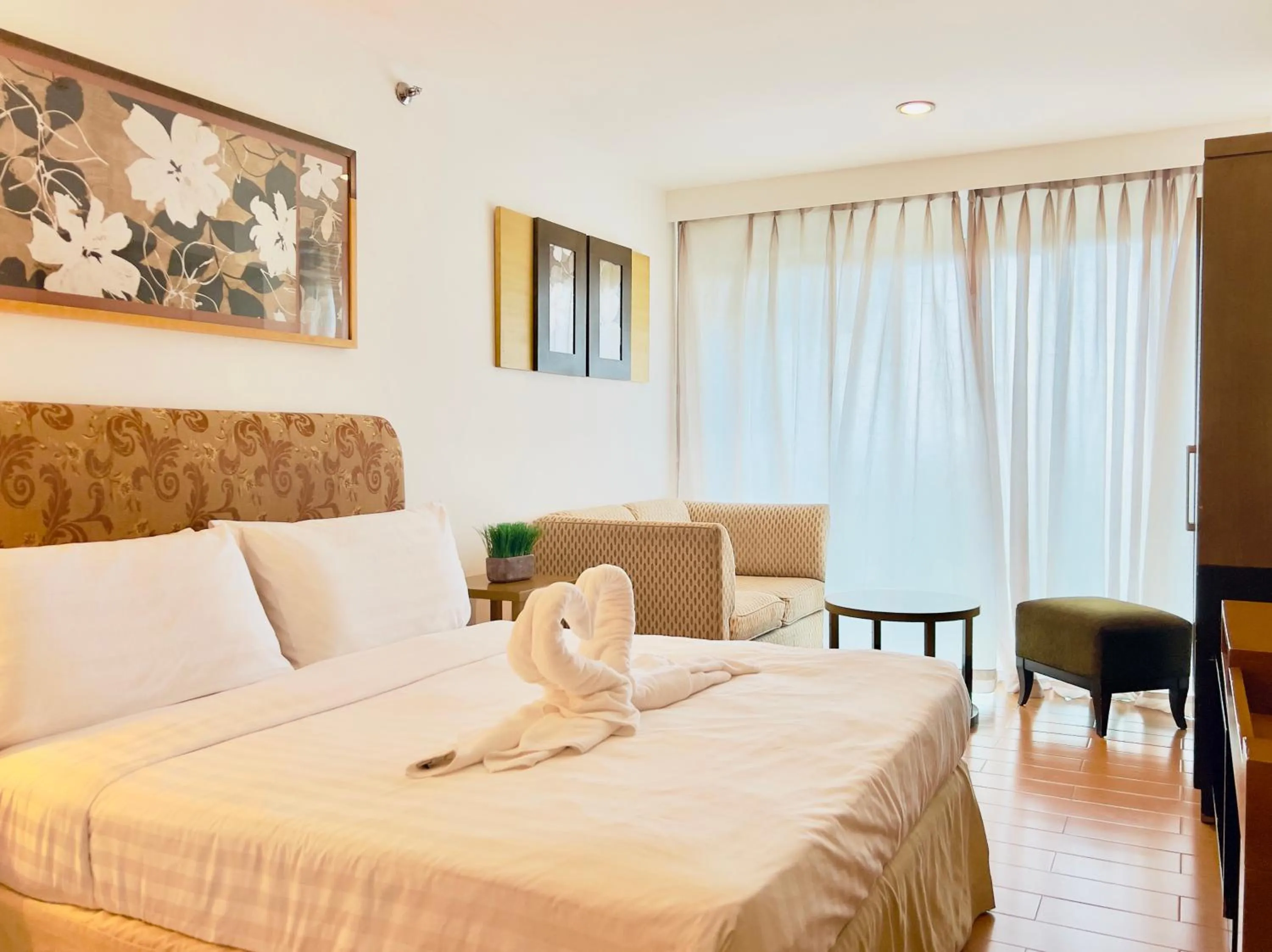 Bed in One Tagaytay Place Hotel Suites OFFICIAL ACCOUNT