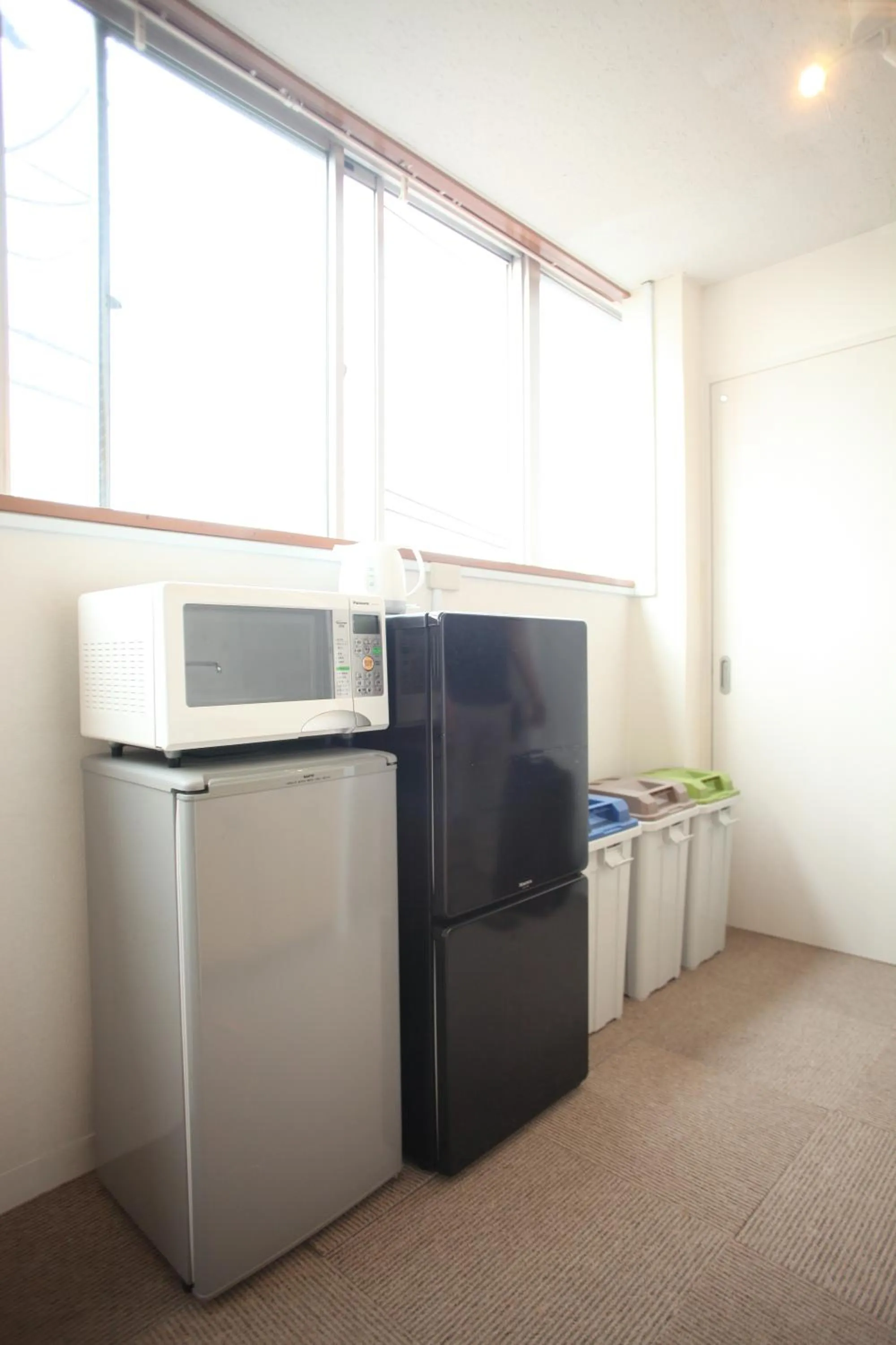 Kitchen or kitchenette in Base Inn Tabata