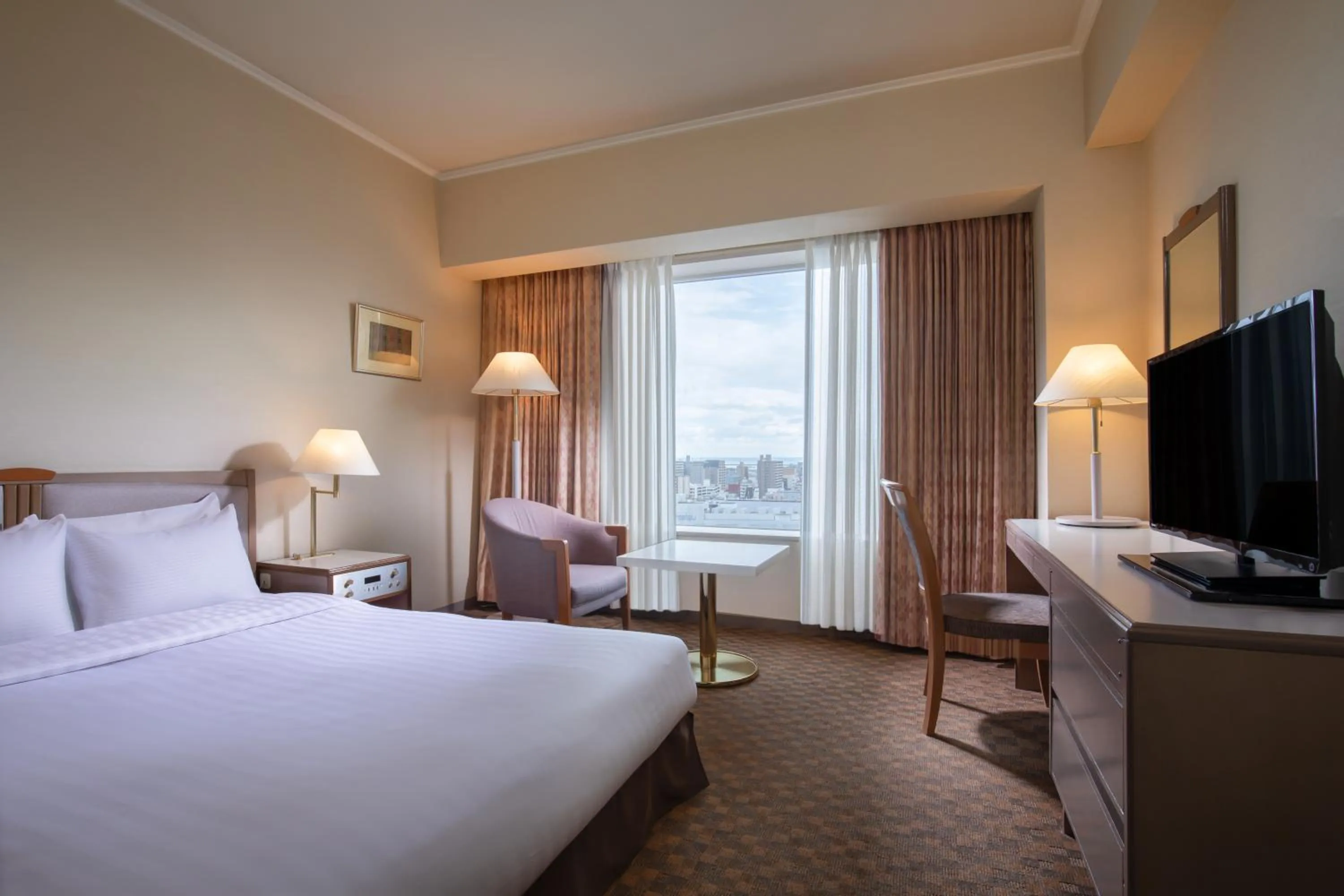 Bed in Miyako Hotel Yokkaichi