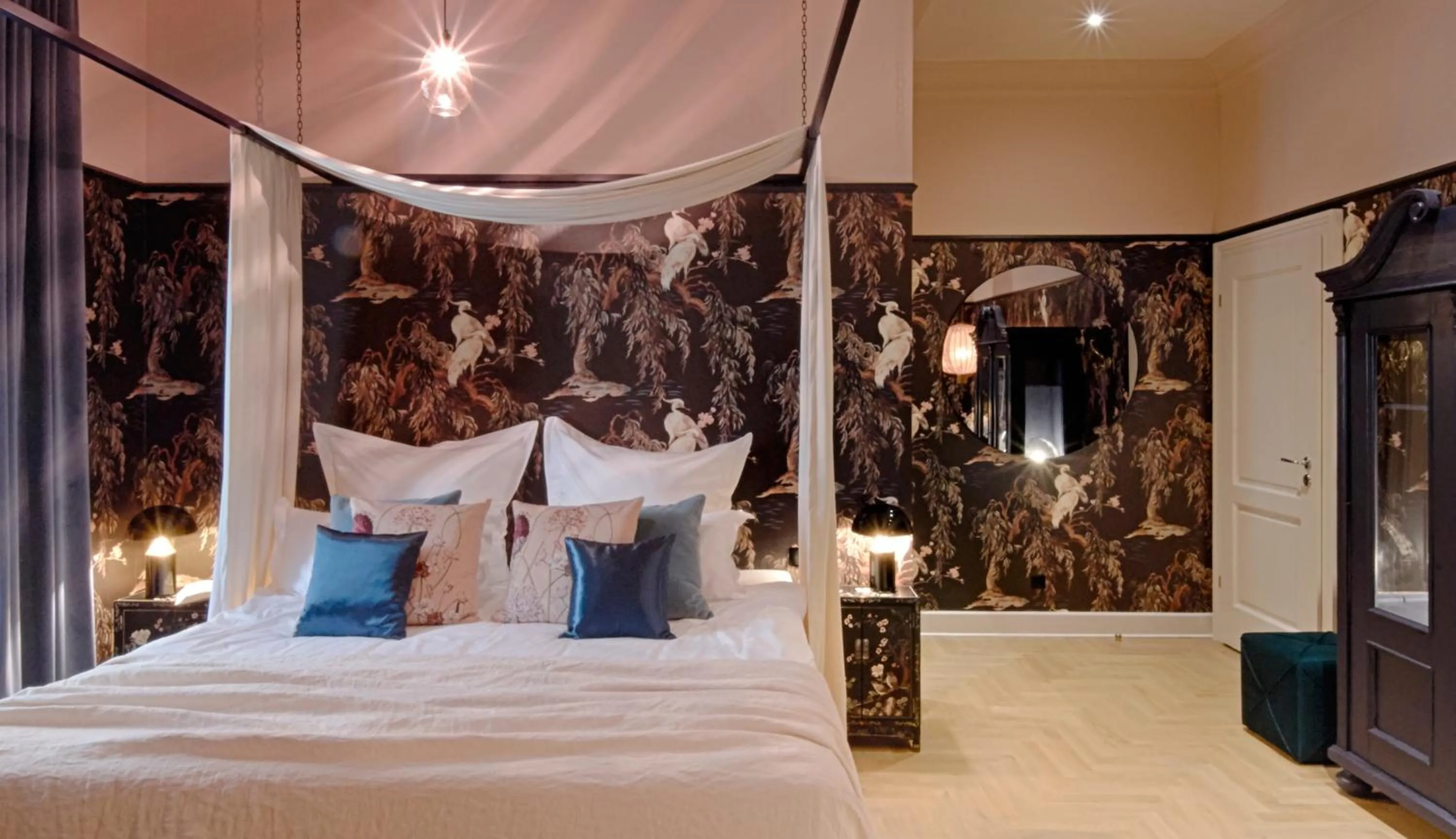 Decorative detail, Bed in Cora Apartments