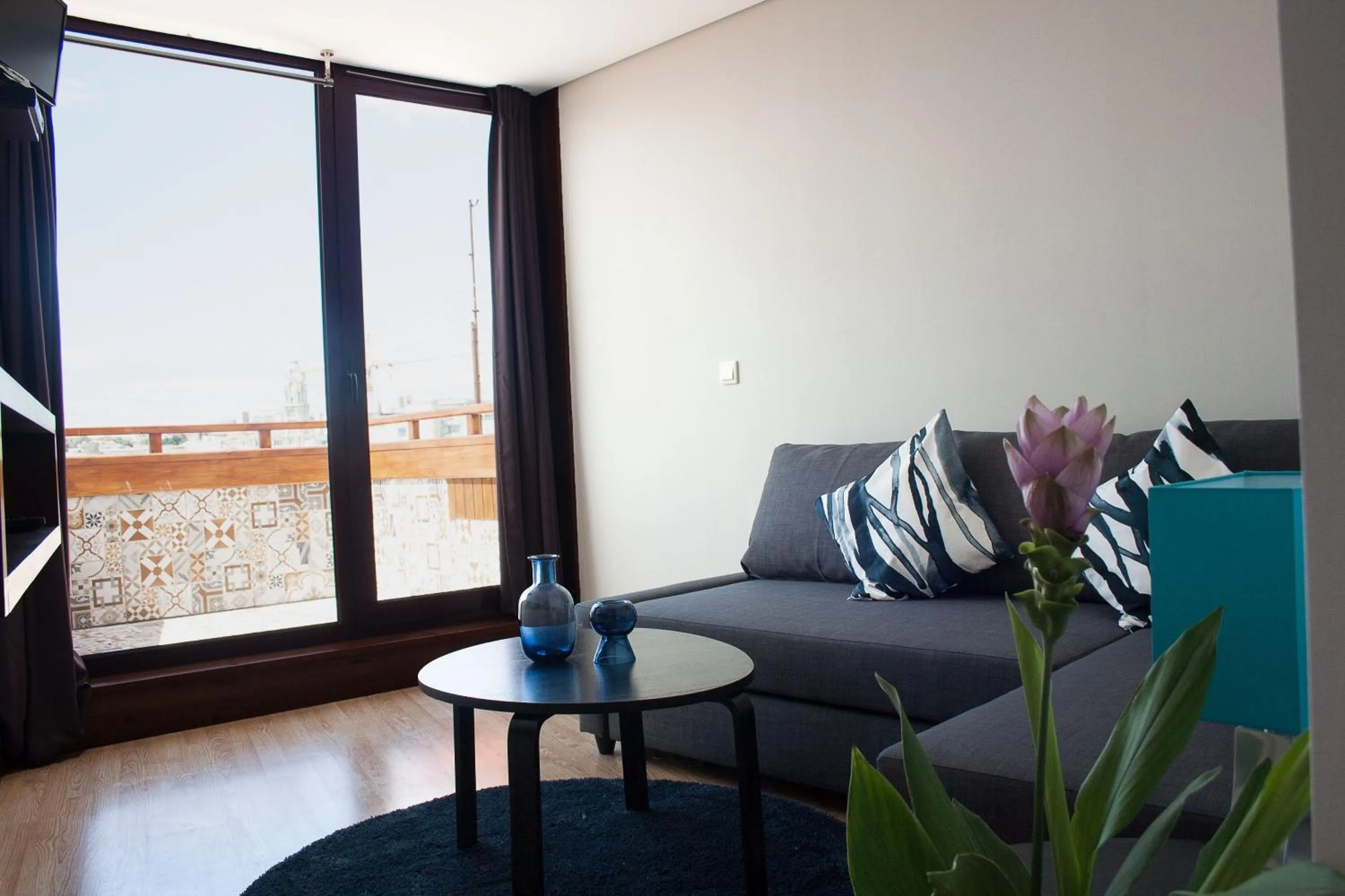 Living room in Nations Porto - Studios & Suites