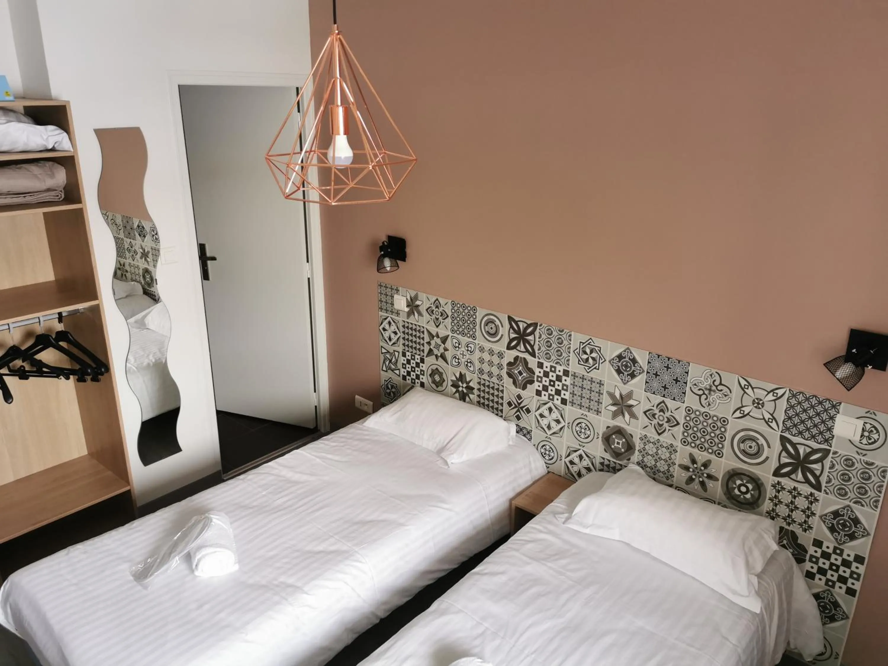 Bed in Logis Hotel- Restaurant La Haie Des Vignes Séminaires et Evènementiel