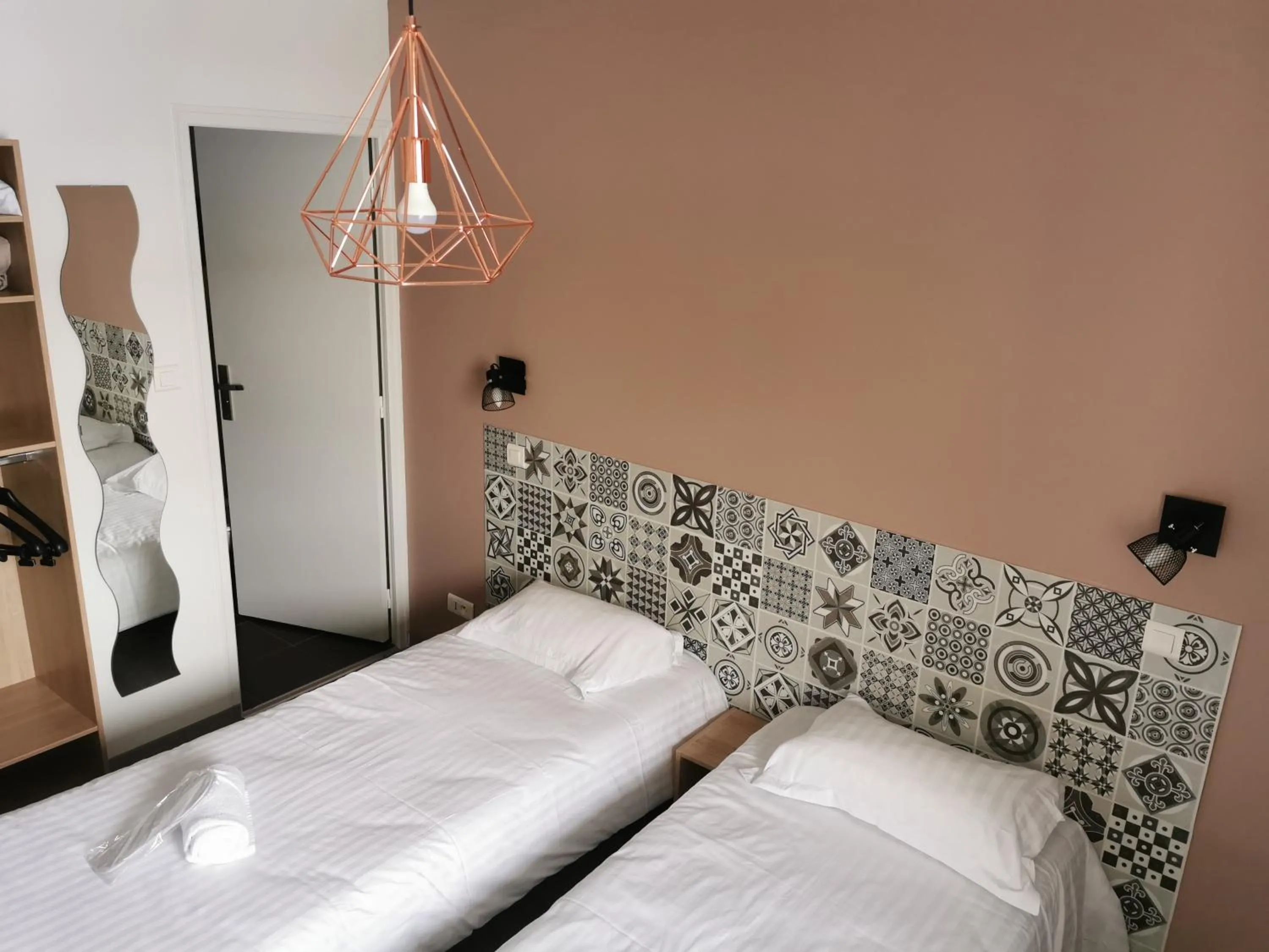 Bed in Logis Hotel- Restaurant La Haie Des Vignes Séminaires et Evènementiel