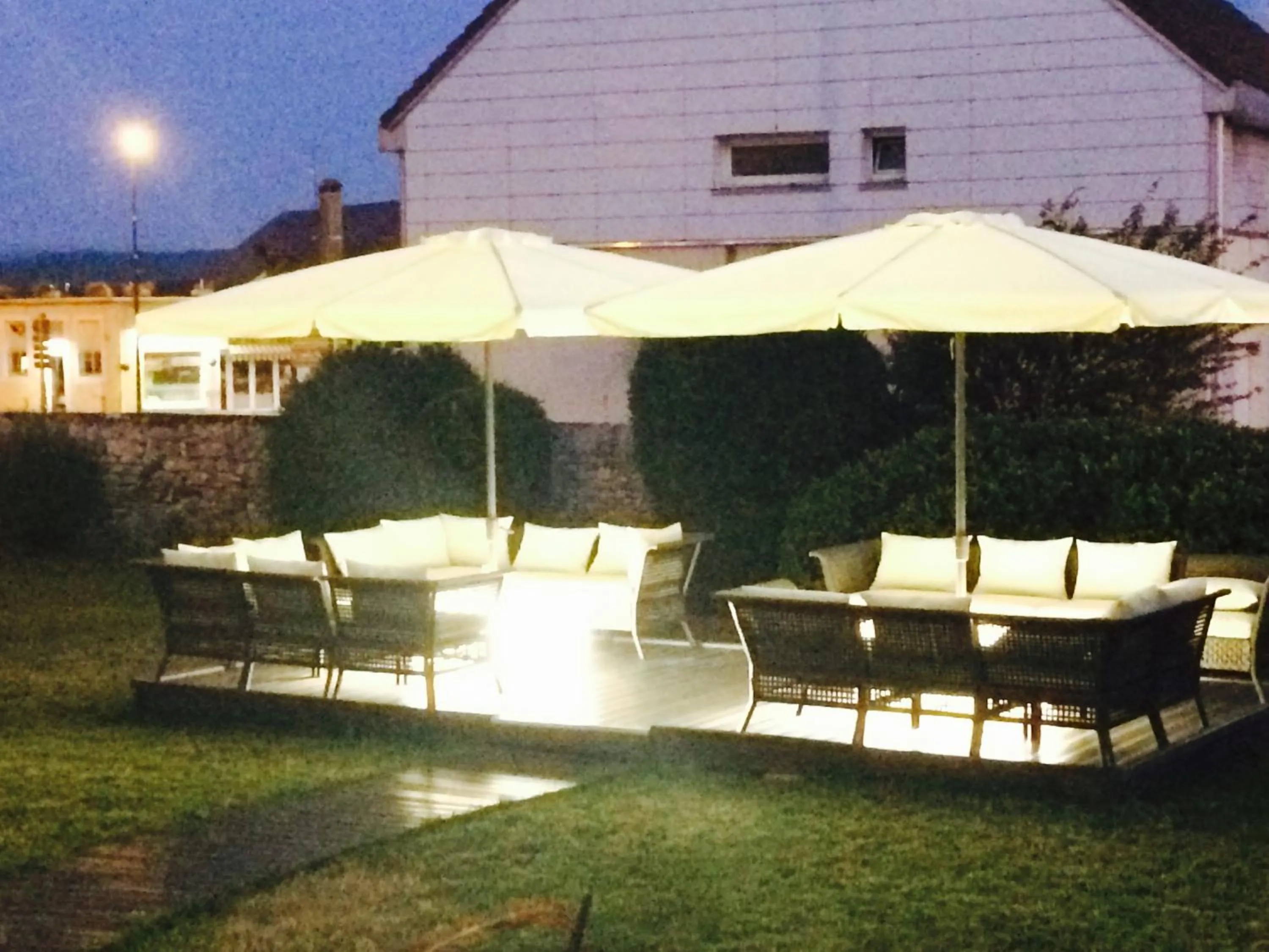 Communal lounge/ TV room in Hôtel Le Vouglans - Restaurant La Valouse