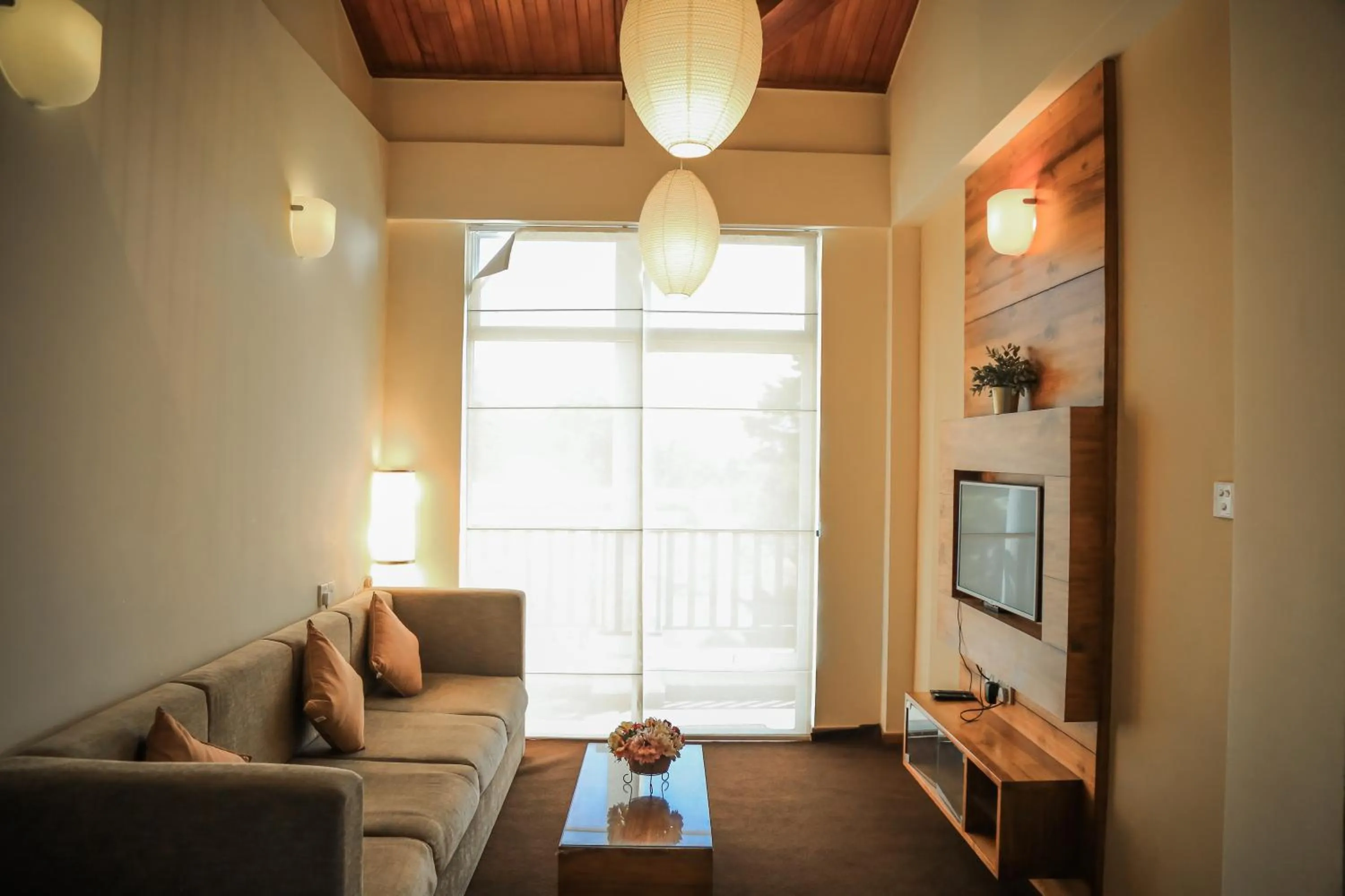 Living room in Emirates Luxury Apartments (Glen Fall Residencies)