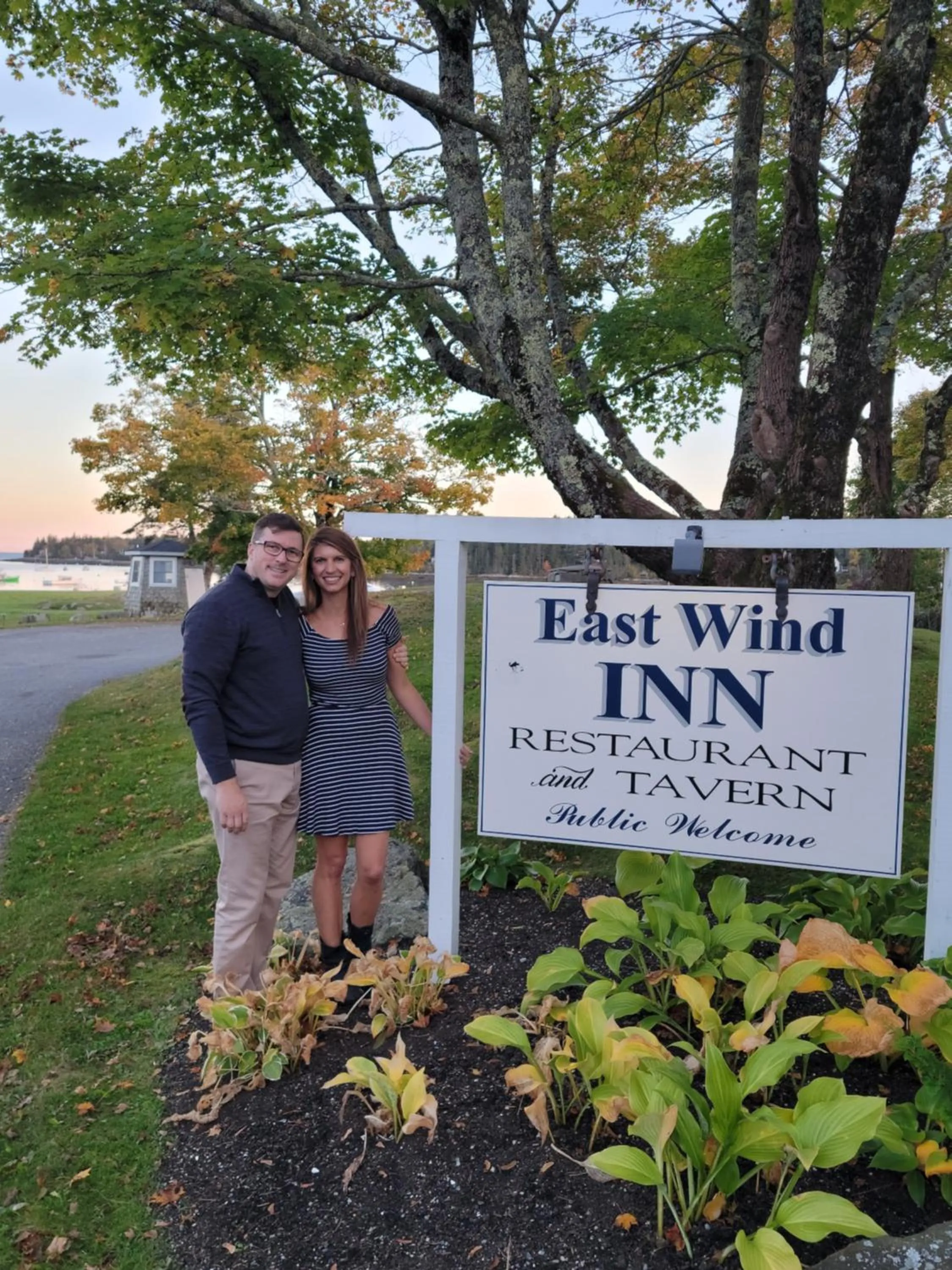 Property logo or sign in East Wind Inn & Suites