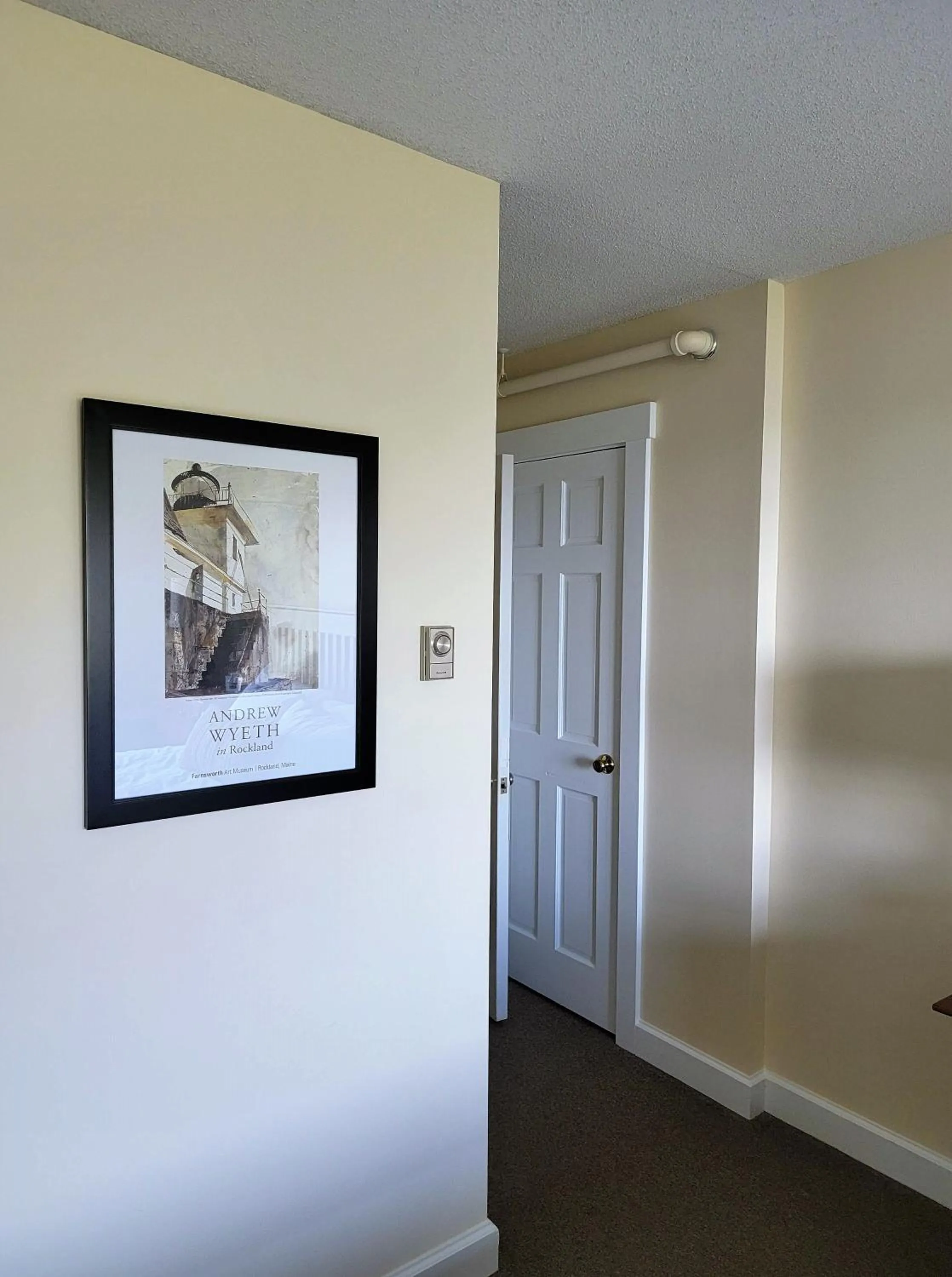 Bedroom in East Wind Inn & Suites