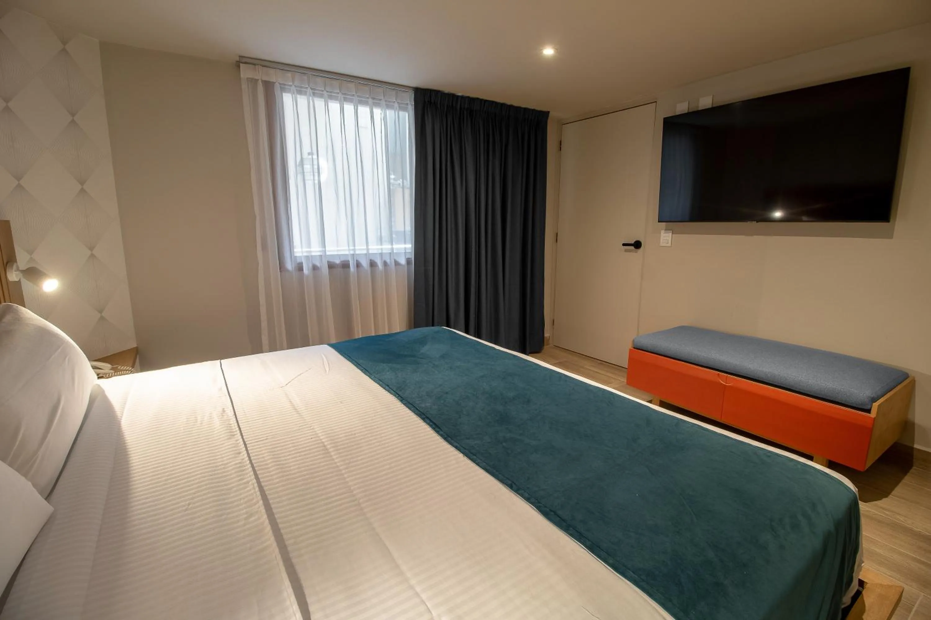 Bed in Oliva Plaza Hotel