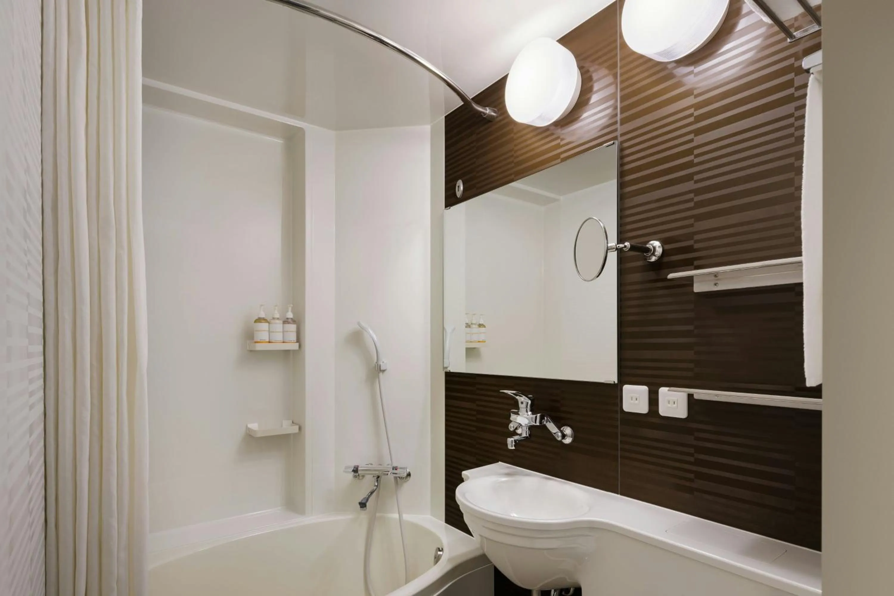 Bathroom in Four Points Flex by Sheraton Shin Osaka