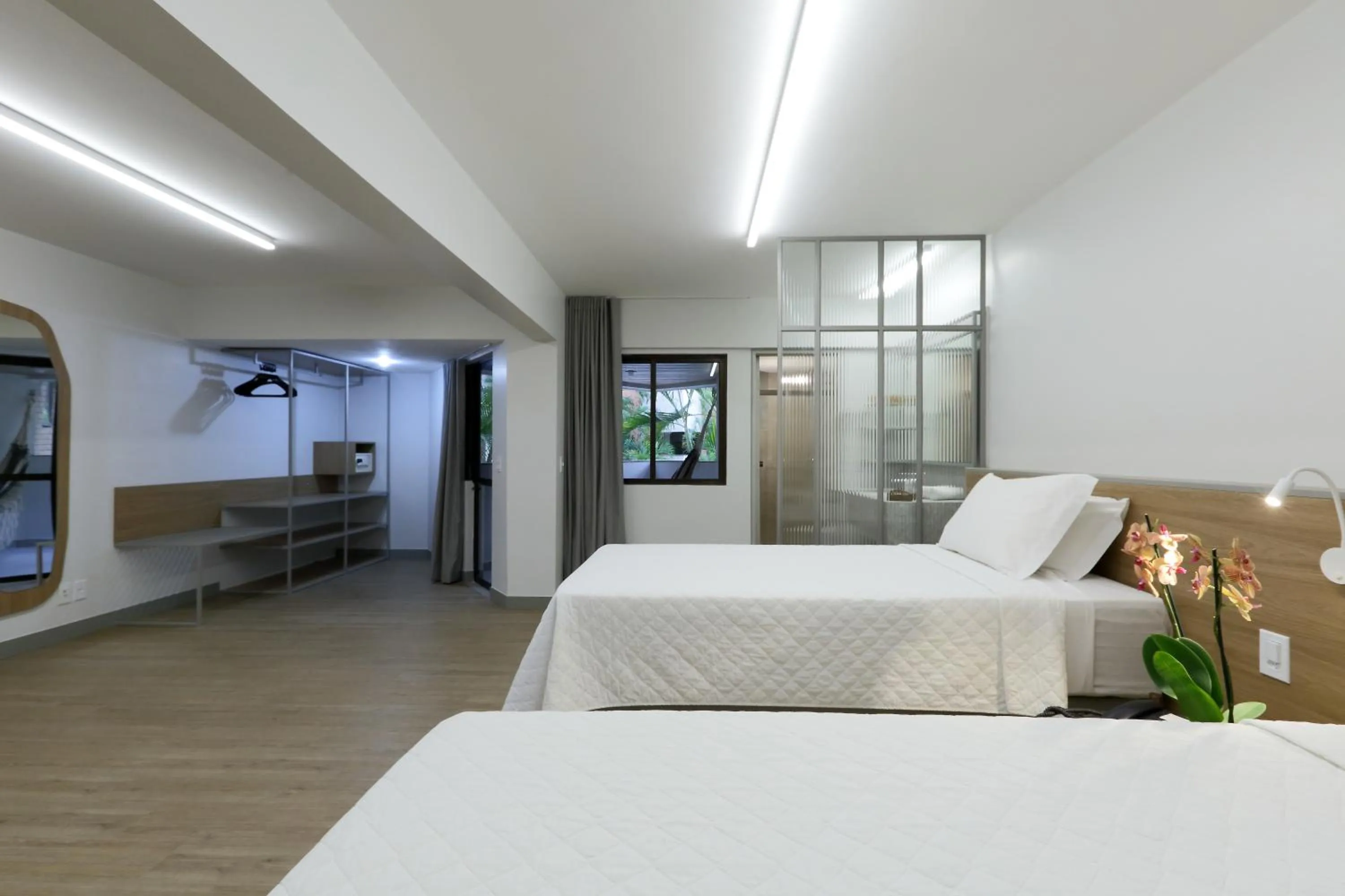 Bed in San Marino Suite Hotel