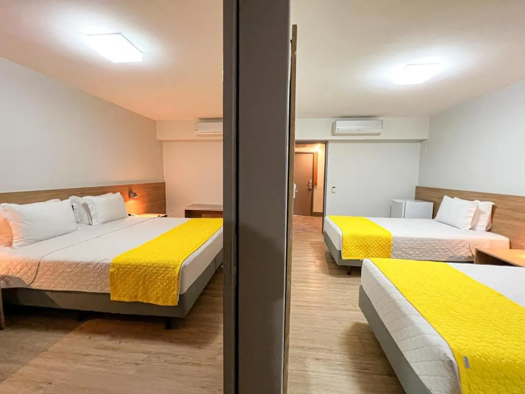 Photo of the whole room, Bed in San Marino Suite Hotel