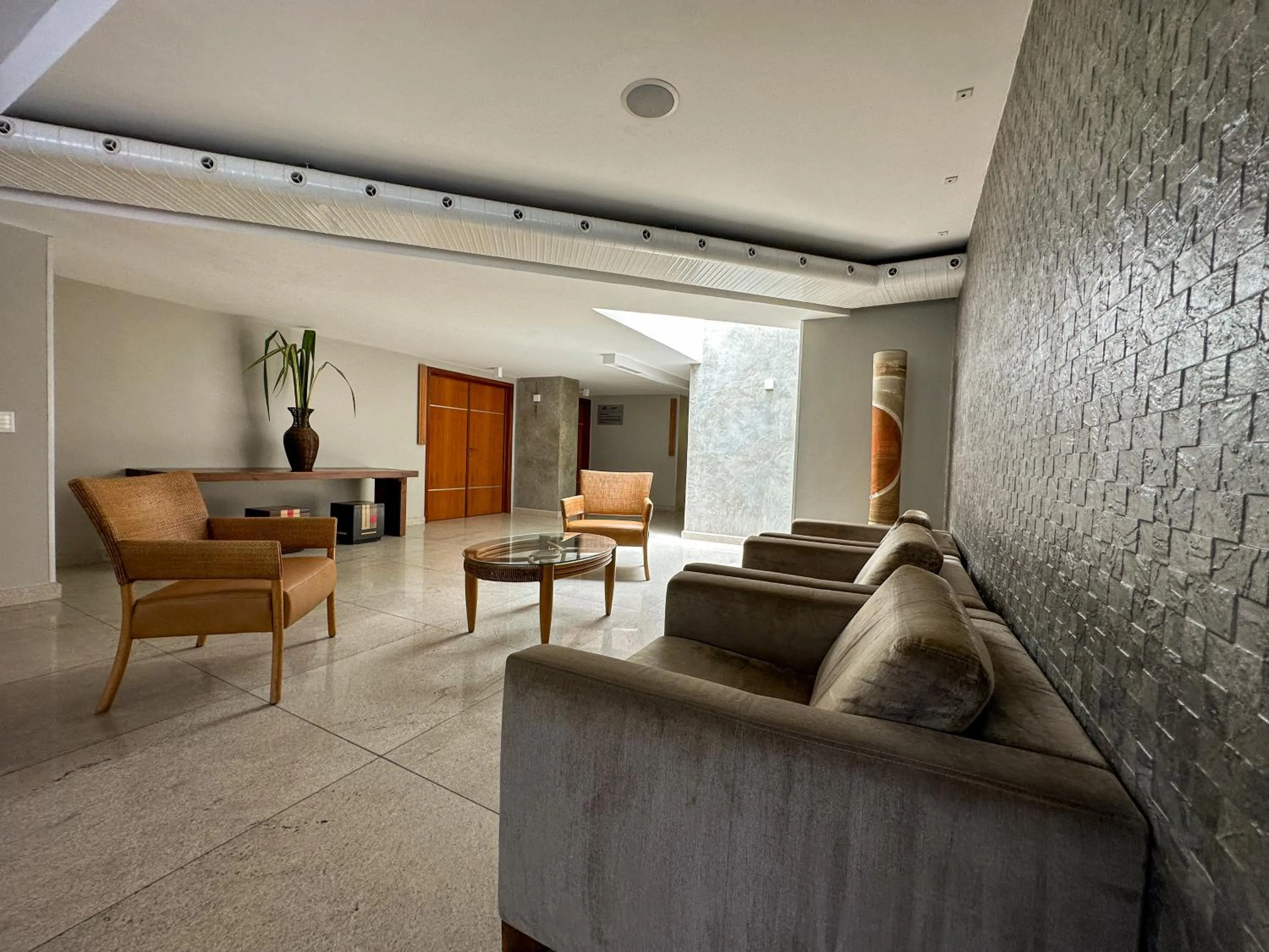 Lobby or reception in San Marino Suite Hotel