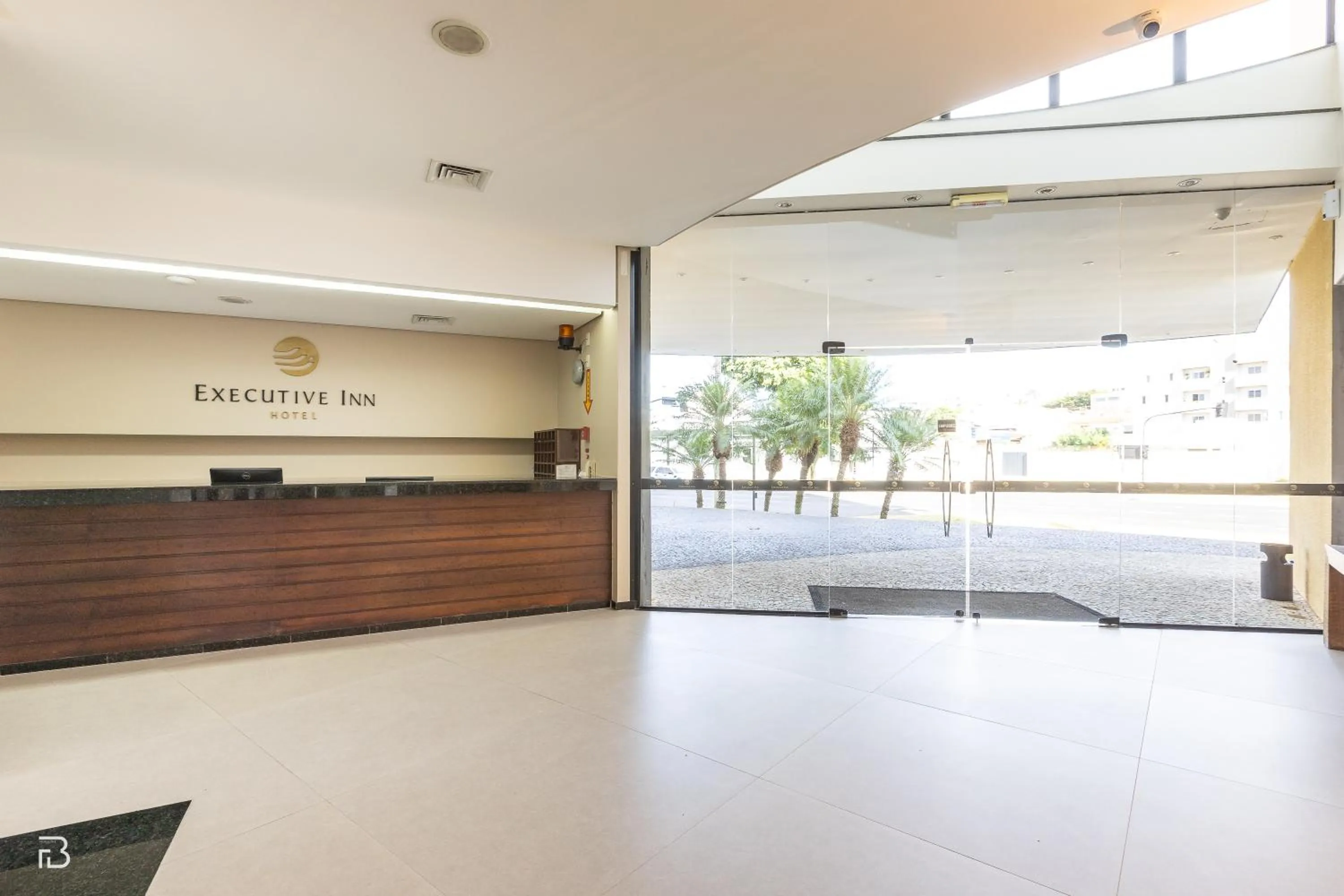 Lobby or reception in Executive Inn Hotel