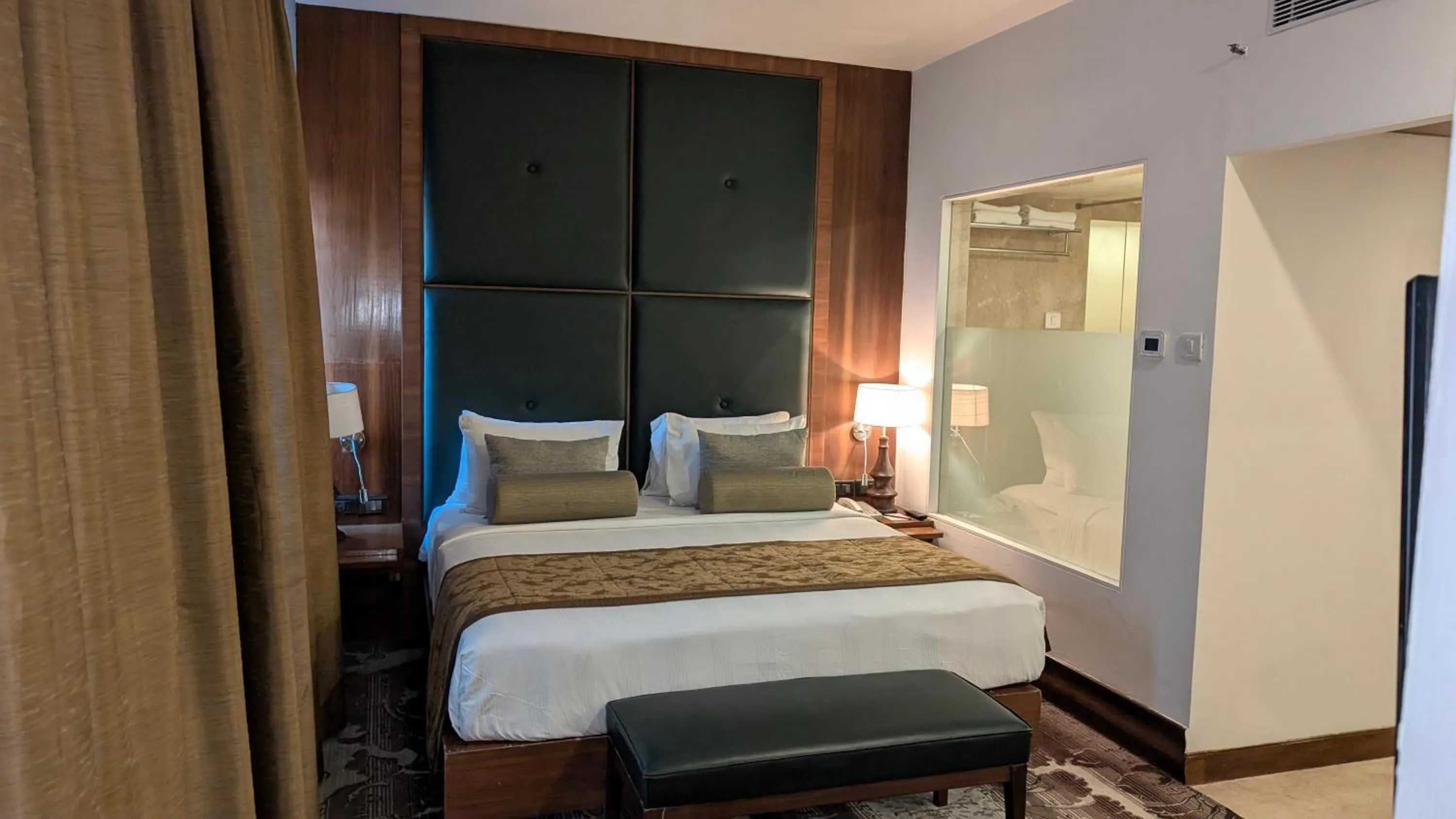 Bed in Pride Hotel, Chennai