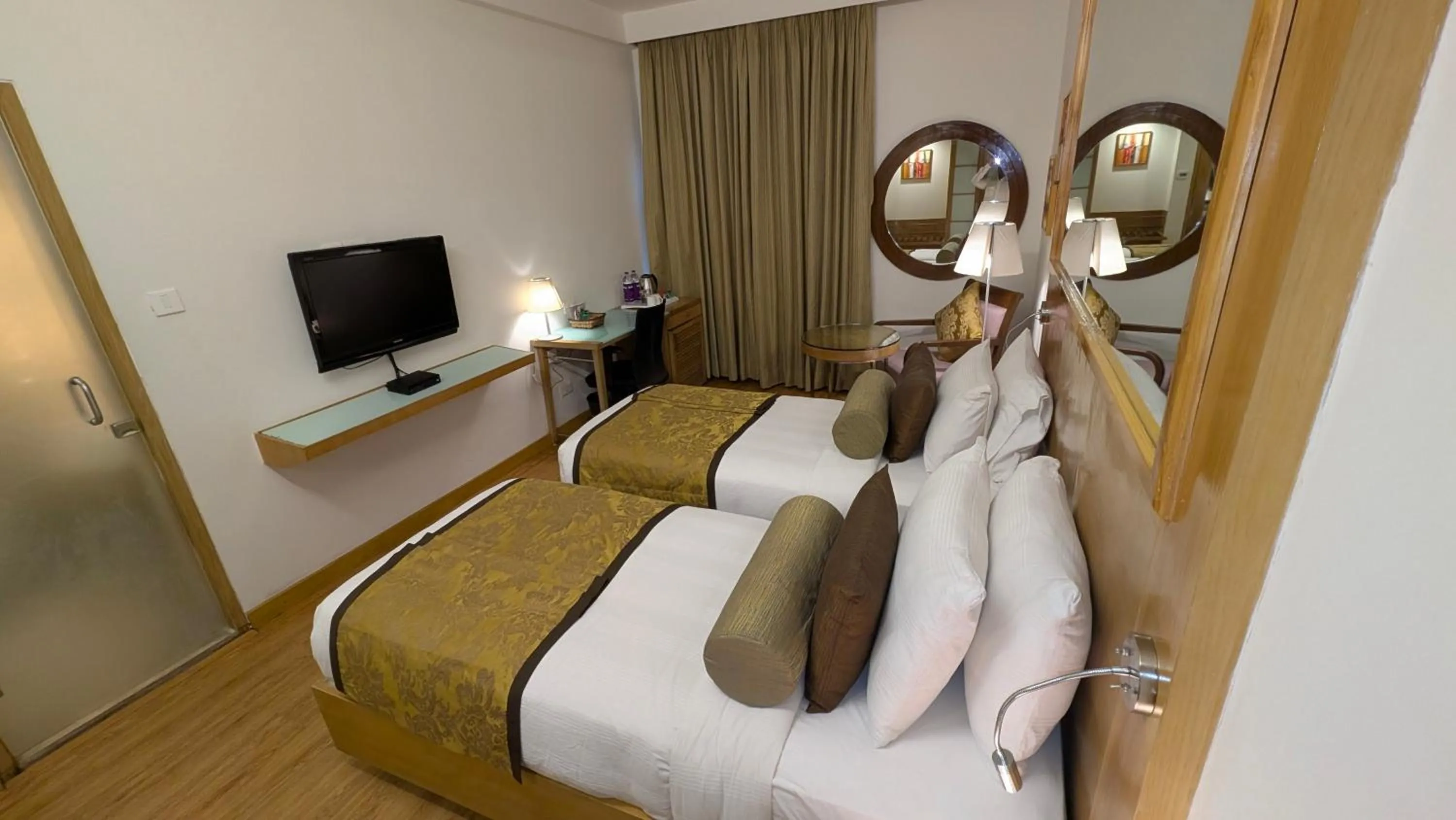 Bed in Pride Hotel, Chennai