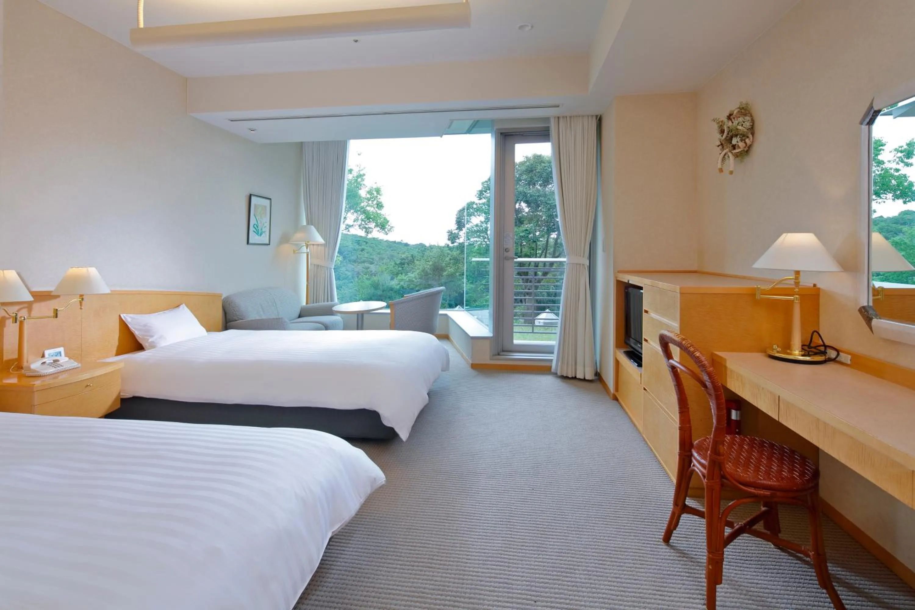 Bed in Miyako Resort Okushima Aqua Forest