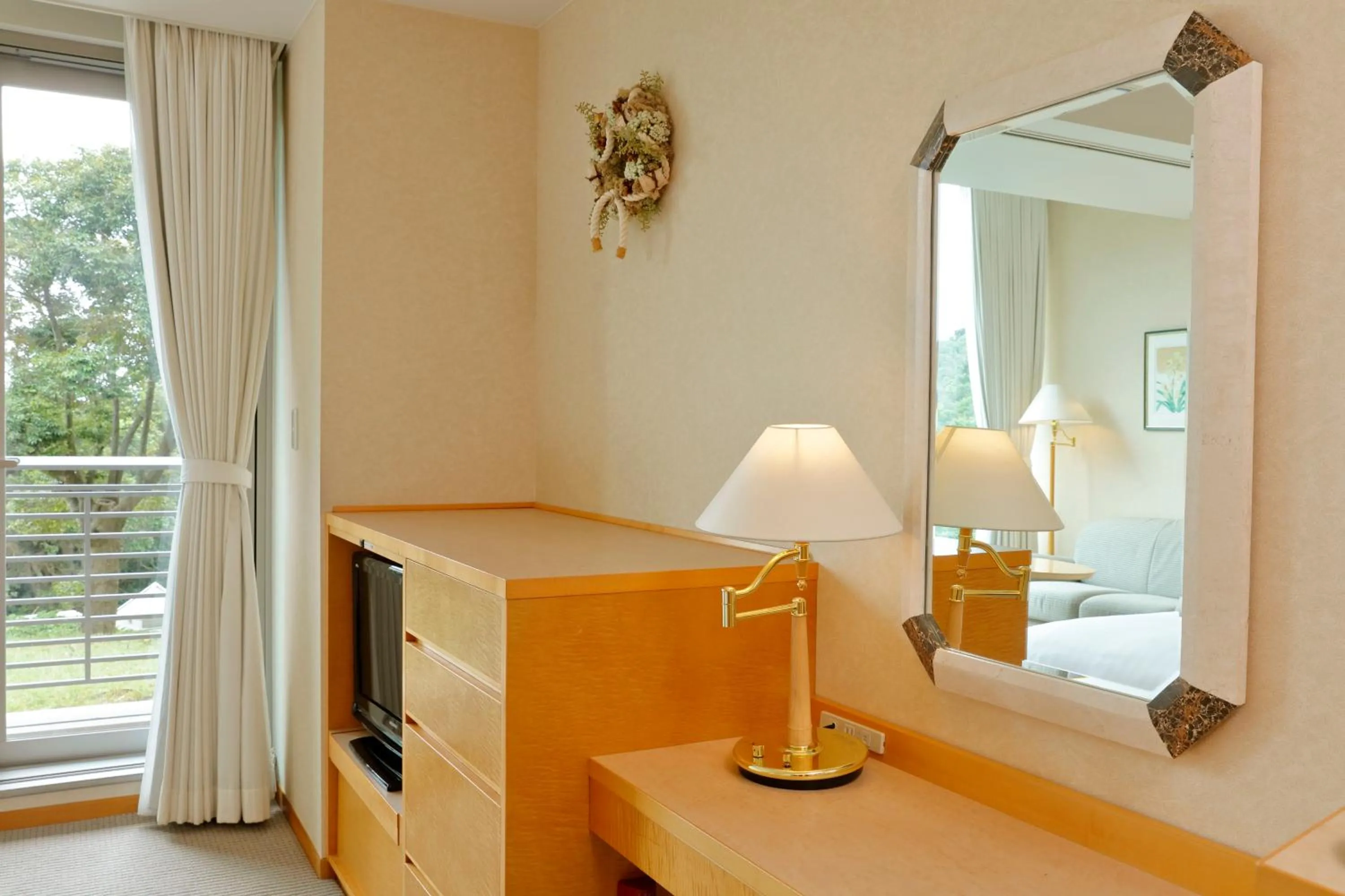 Bed in Miyako Resort Okushima Aqua Forest