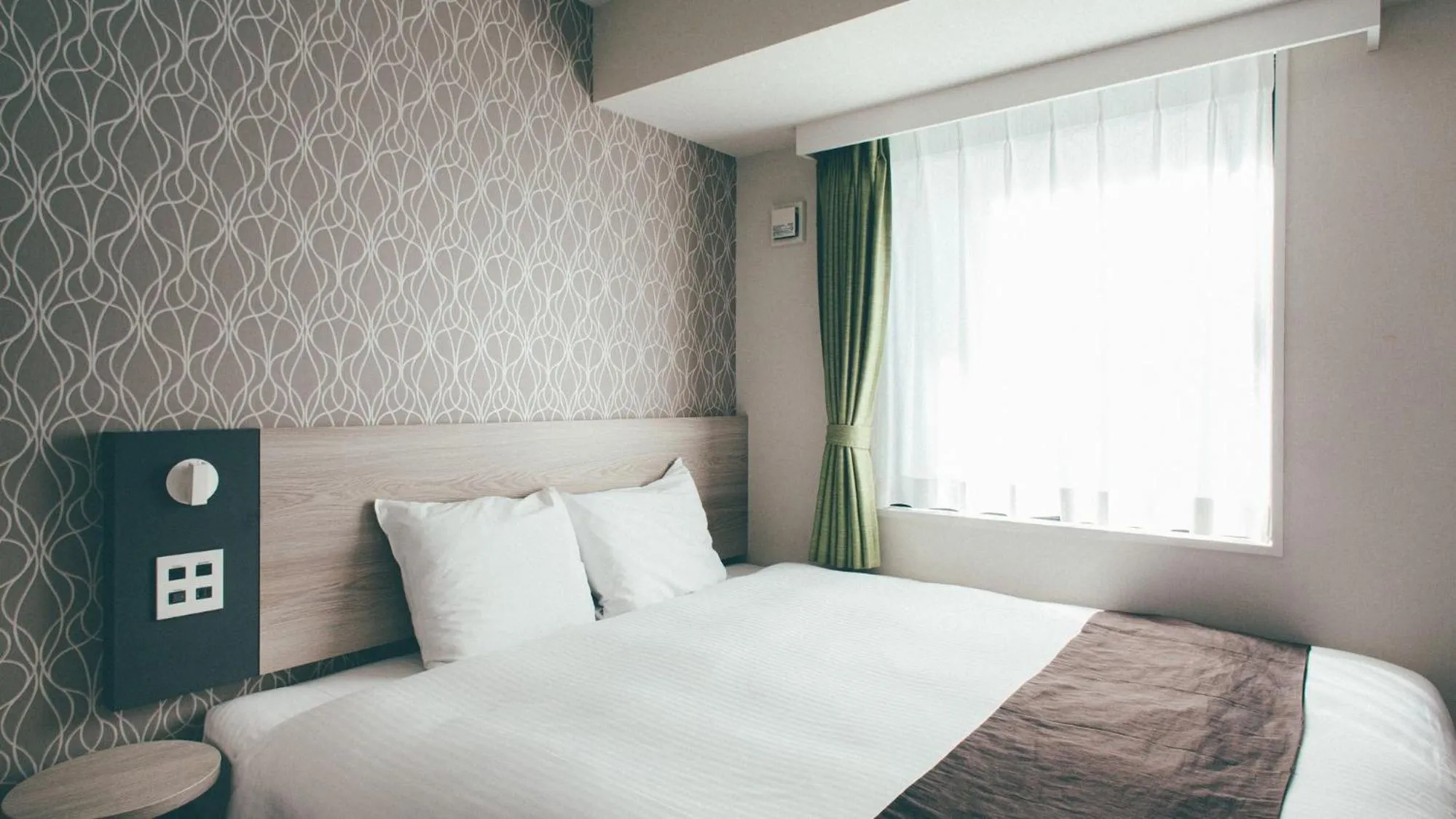 Bed in Kuretake Inn Premium Nagoya Nayabashi