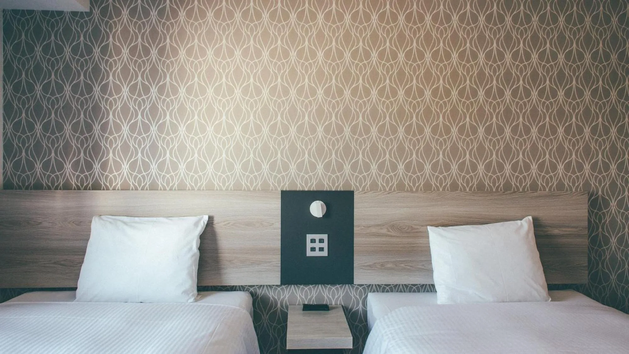 Bed in Kuretake Inn Premium Nagoya Nayabashi