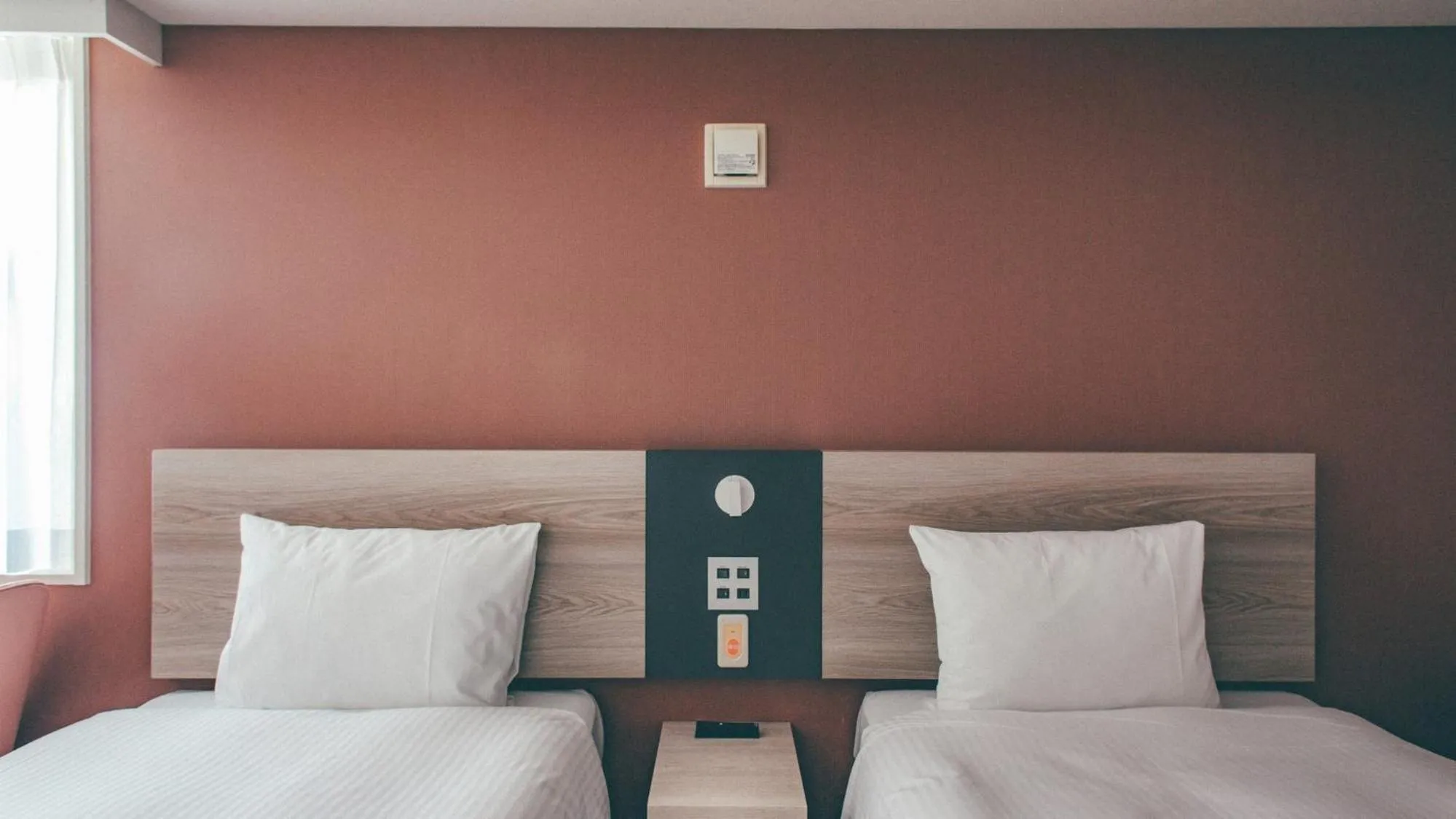 Bed in Kuretake Inn Premium Nagoya Nayabashi