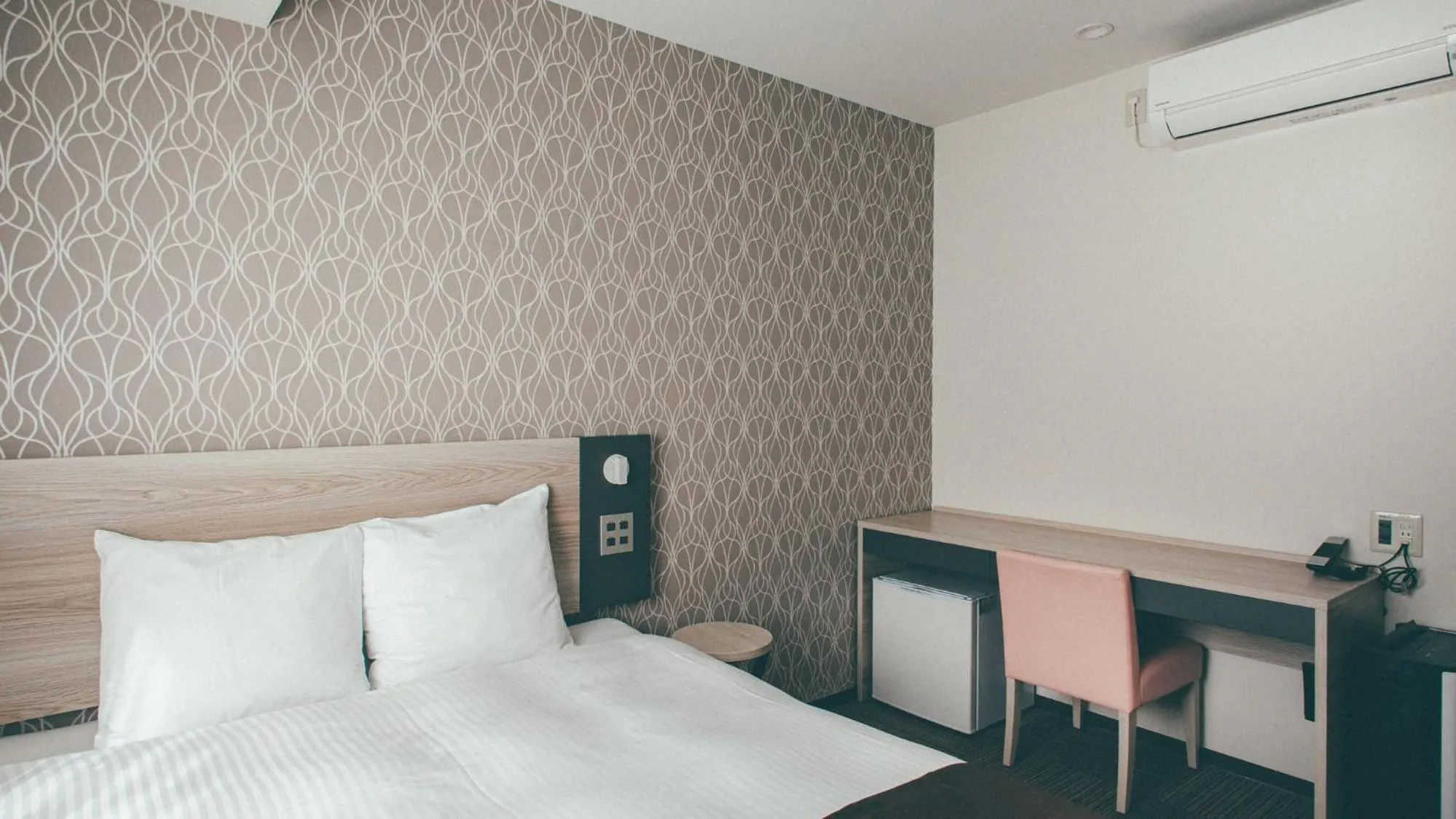 Bed in Kuretake Inn Premium Nagoya Nayabashi