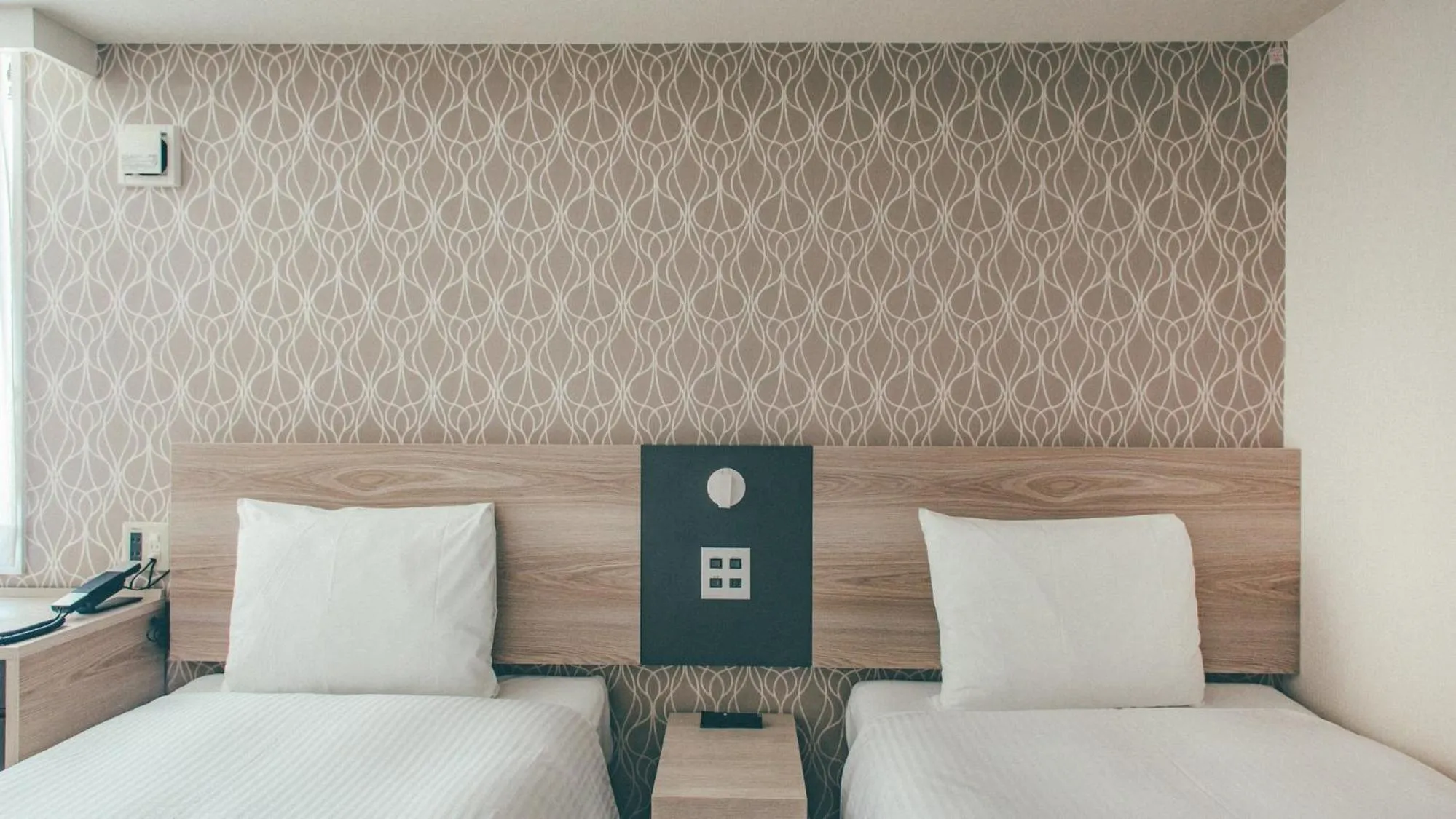 Bed in Kuretake Inn Premium Nagoya Nayabashi