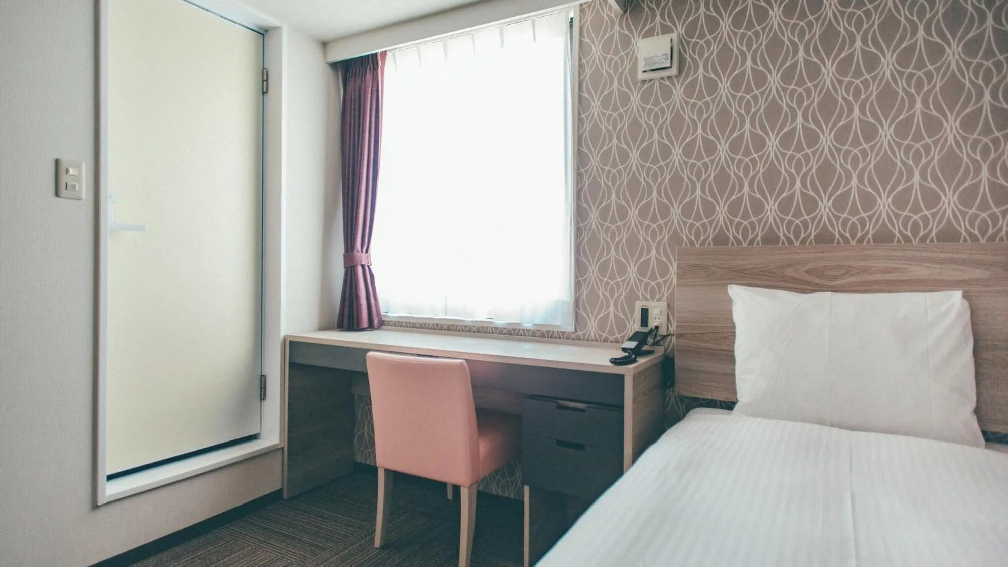 Bed in Kuretake Inn Premium Nagoya Nayabashi