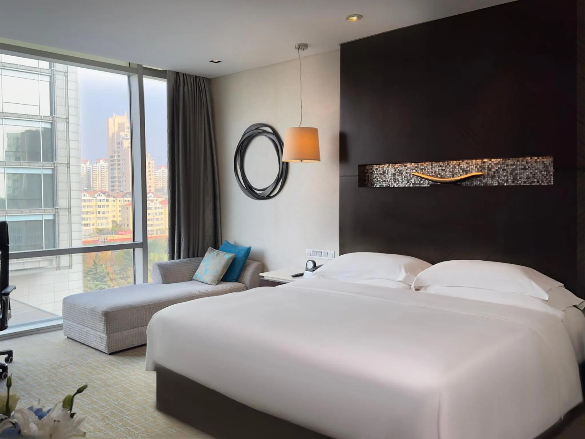Photo of the whole room, Bed in InterContinental Qingdao by IHG l Inside the Olympic Sailing Center l May Fourth Square
