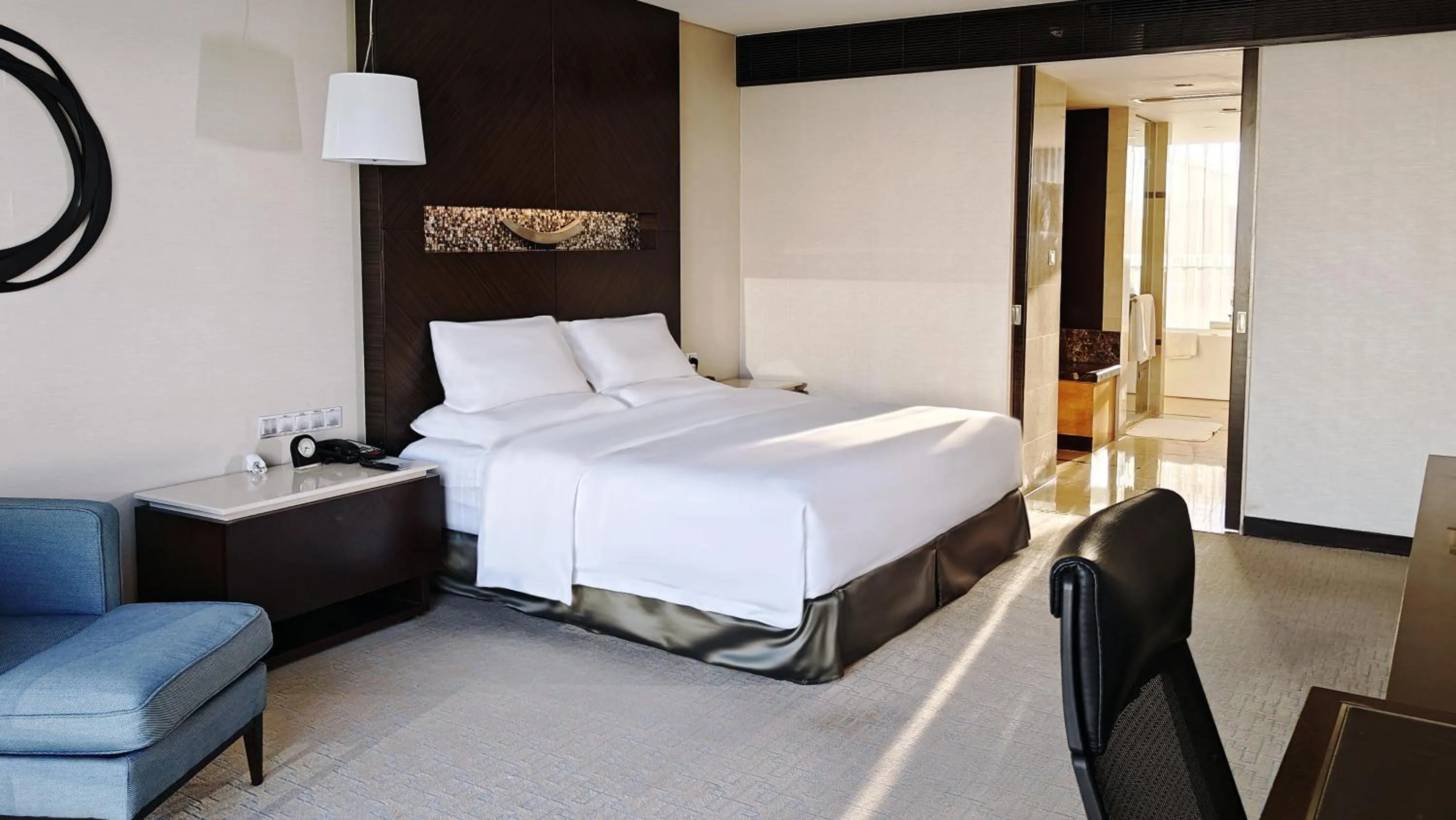 Photo of the whole room, Bed in InterContinental Qingdao by IHG l Inside the Olympic Sailing Center l May Fourth Square