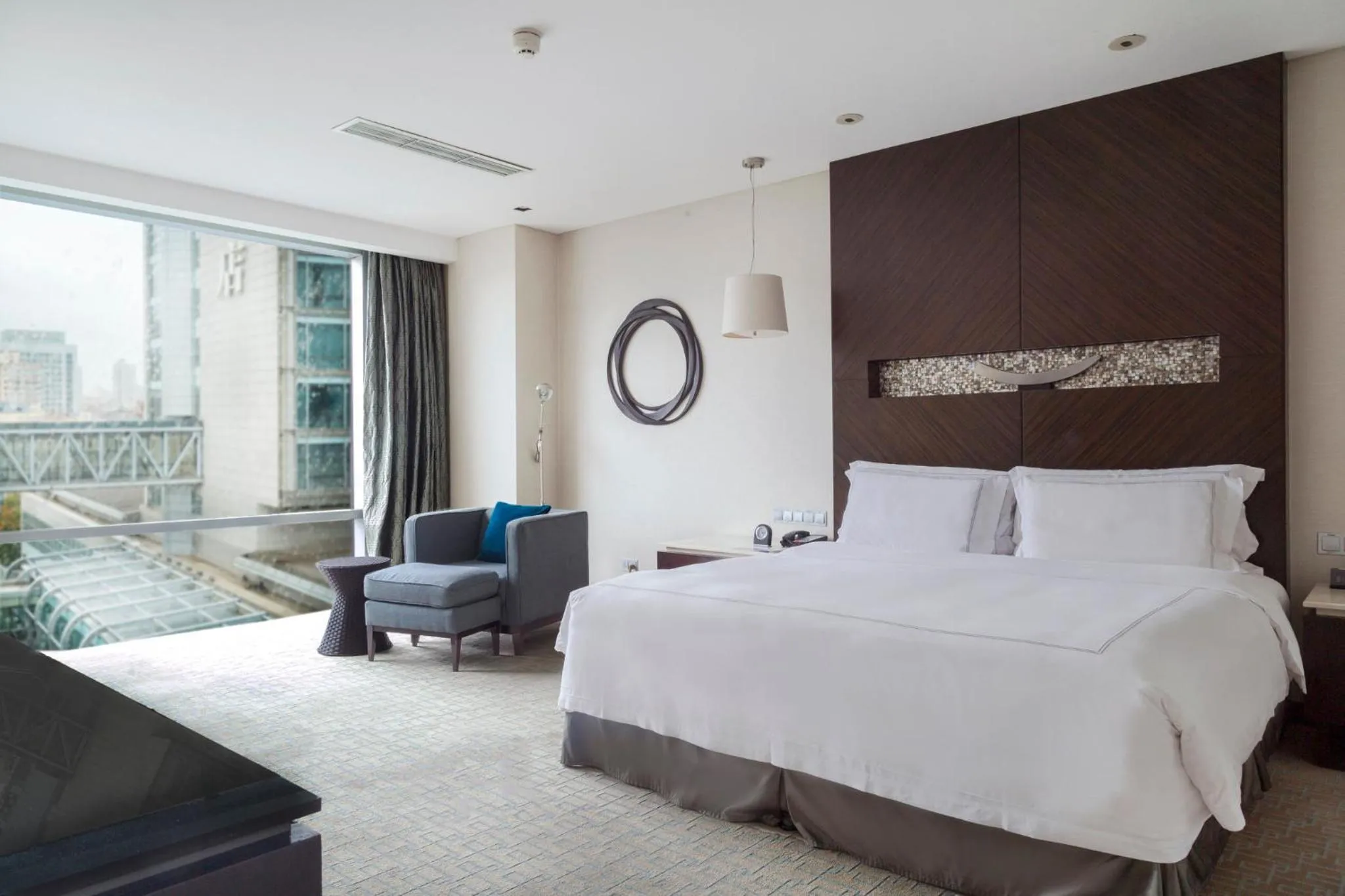 Photo of the whole room, Bed in InterContinental Qingdao by IHG l Inside the Olympic Sailing Center l May Fourth Square