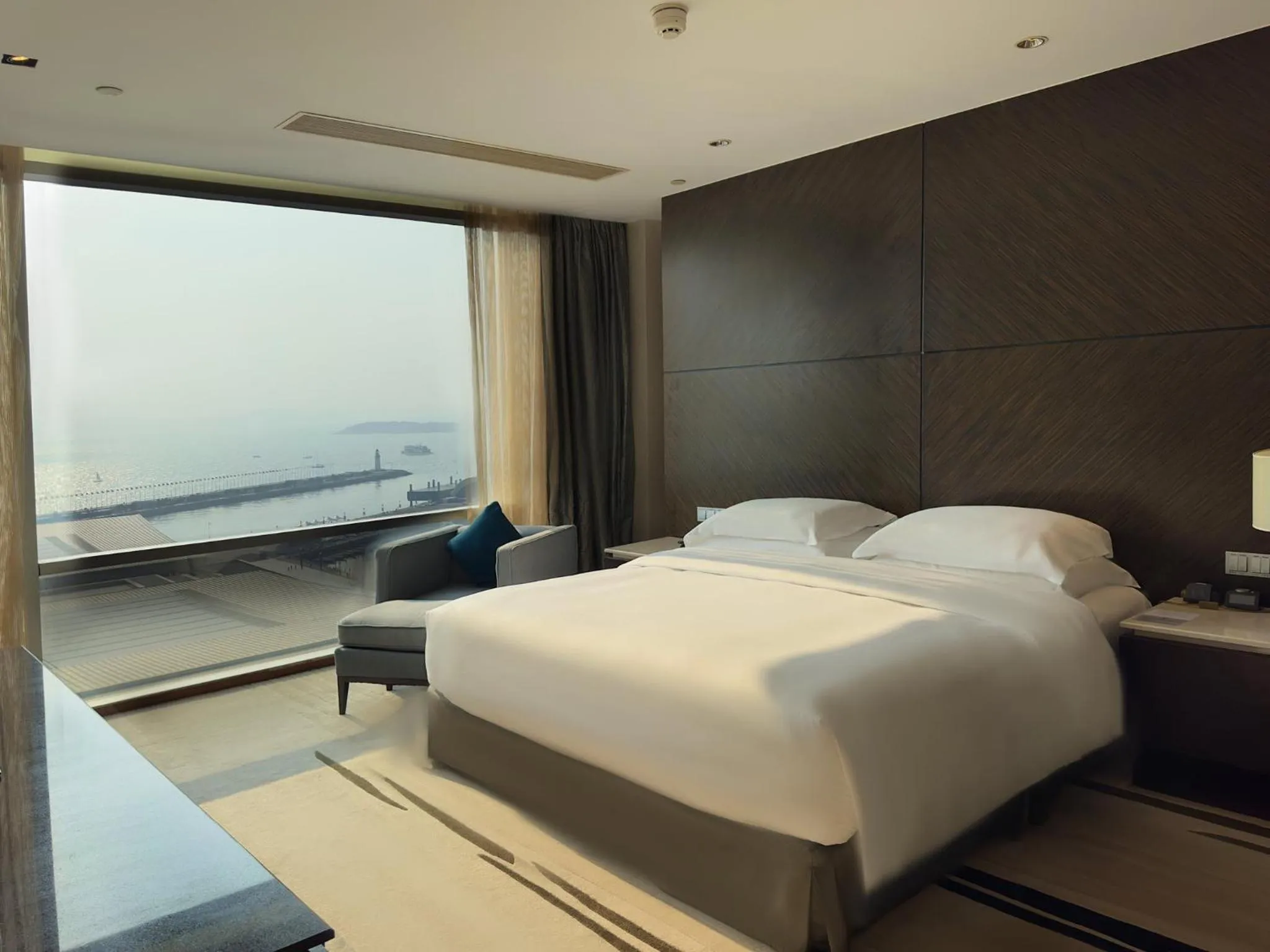 Photo of the whole room, Bed in InterContinental Qingdao by IHG l Inside the Olympic Sailing Center l May Fourth Square