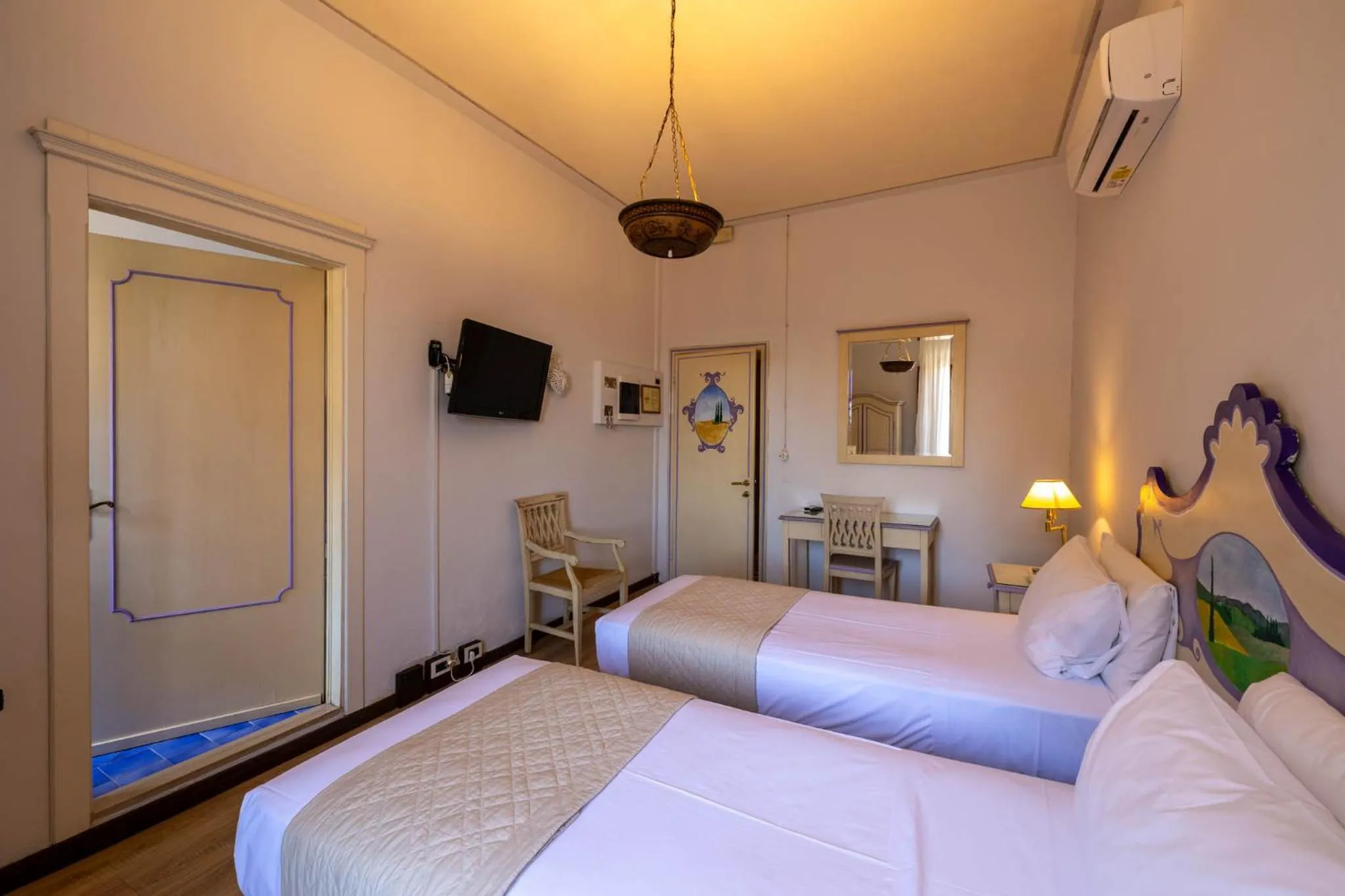 Bed in Quattro Gigli Hotel